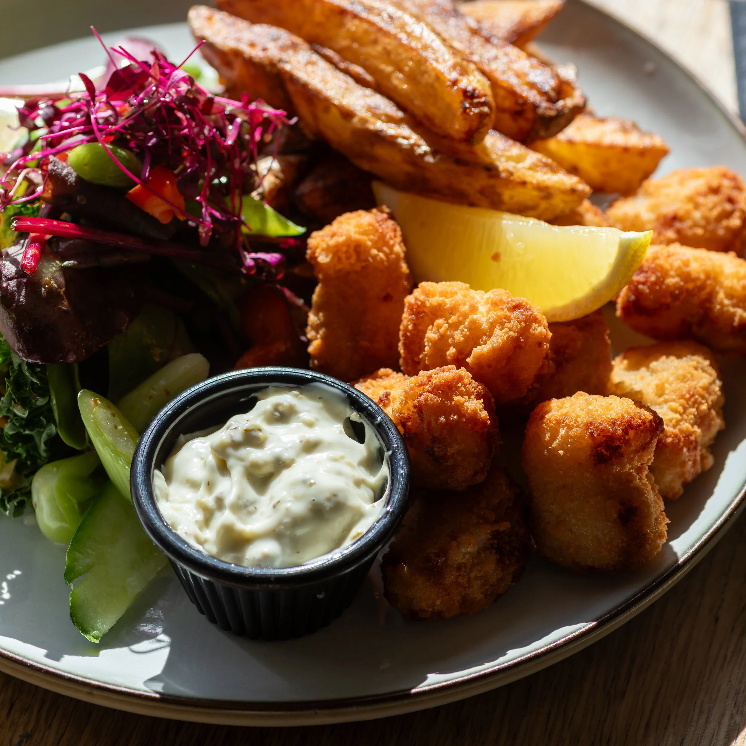 Scampi, chips and salad at The Folly Wine Bar in Petersfield, Hampshire. Food photography by Sequoia Studios.