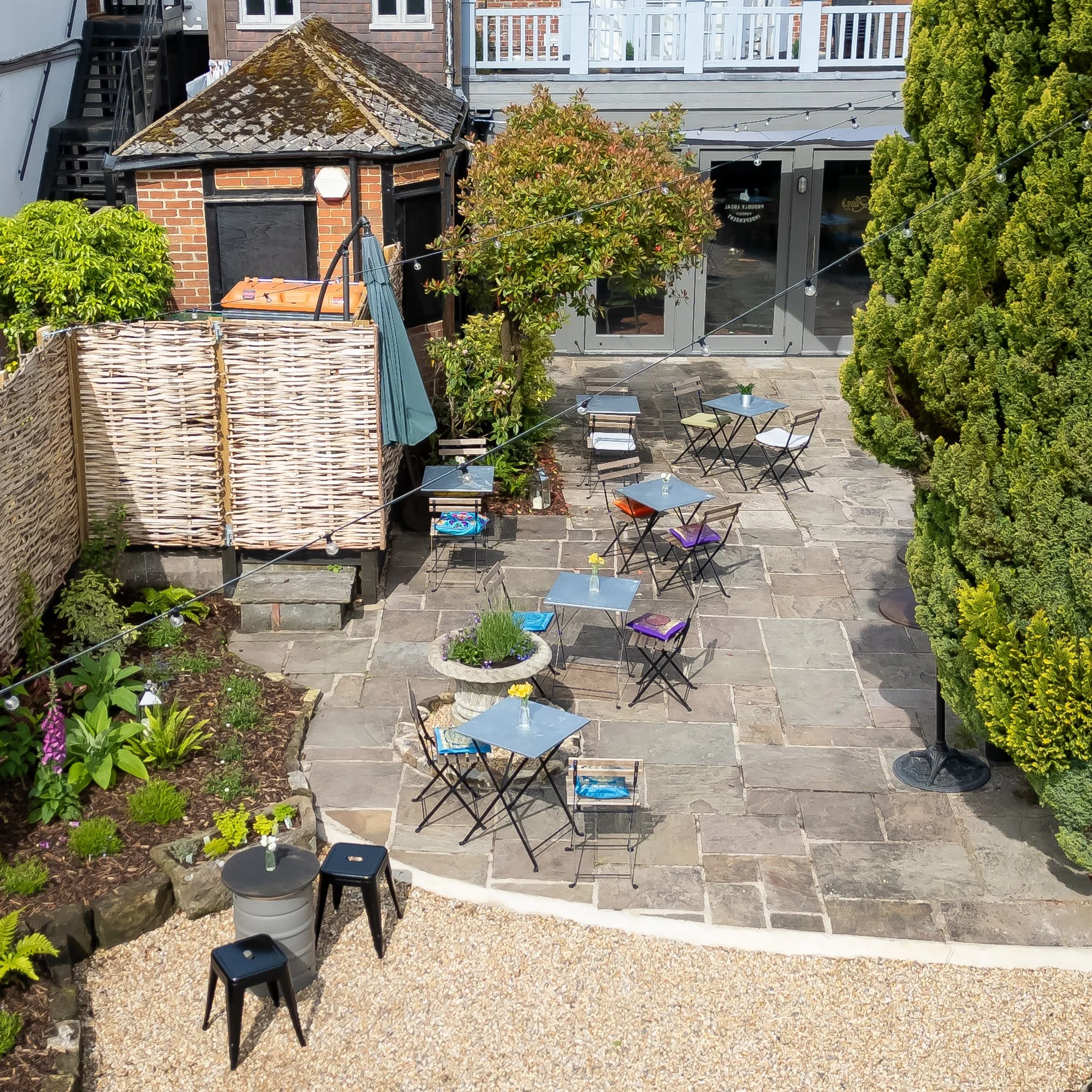 Drone shot of the courtyard of The Lion's Den café in Midhurst, West Sussex