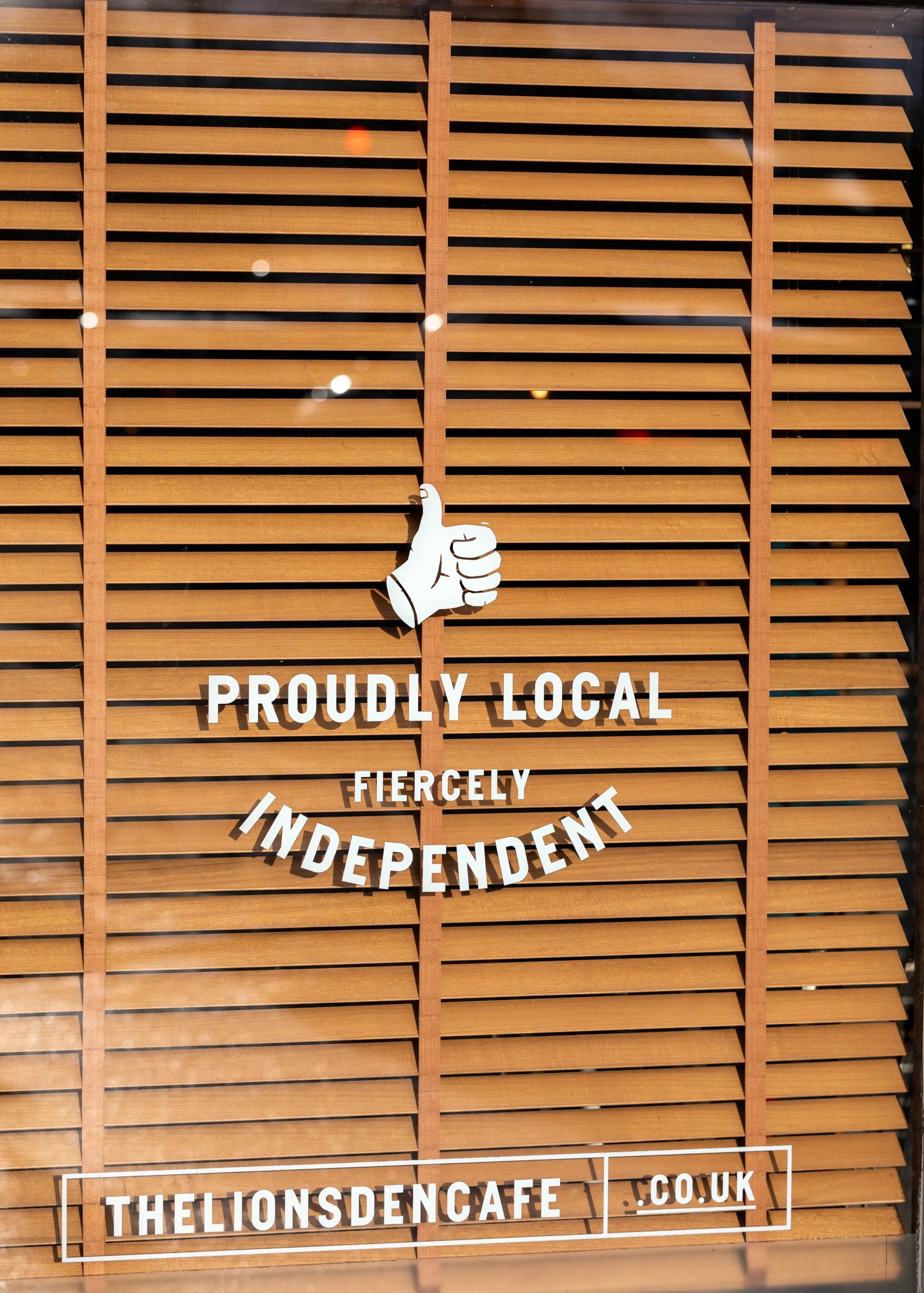 Proudly Local & Fiercely Independent window decal – The Lion's Den Café, Haslemere, Surrey – Hospitality Venue Photography by Sequoia Studios