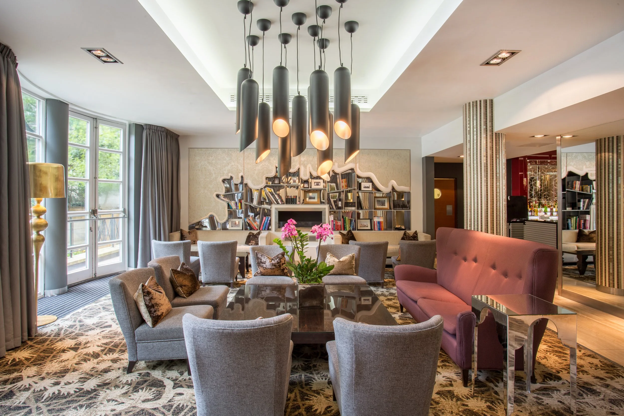 Garden lounge seating at Crowne Plaza hotel in Kensington, London