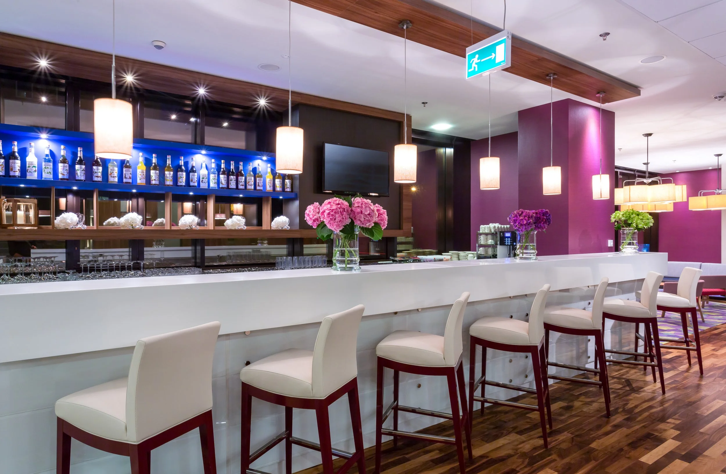 Evening shot of hotel bar at Hampton by Hilton, Warsaw, Poland