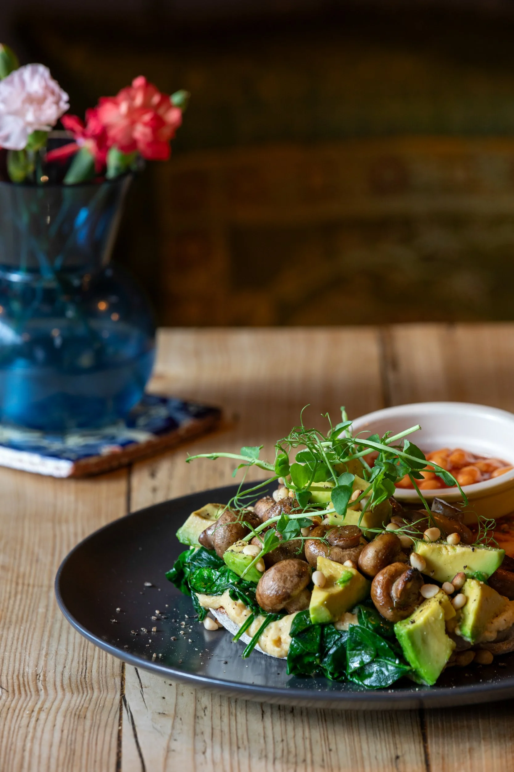 Vegan breakfast featuring avocado and wilted spinach  – The Lion's Den Café, Haslemere, Surrey – Food Photography by Sequoia Studios
