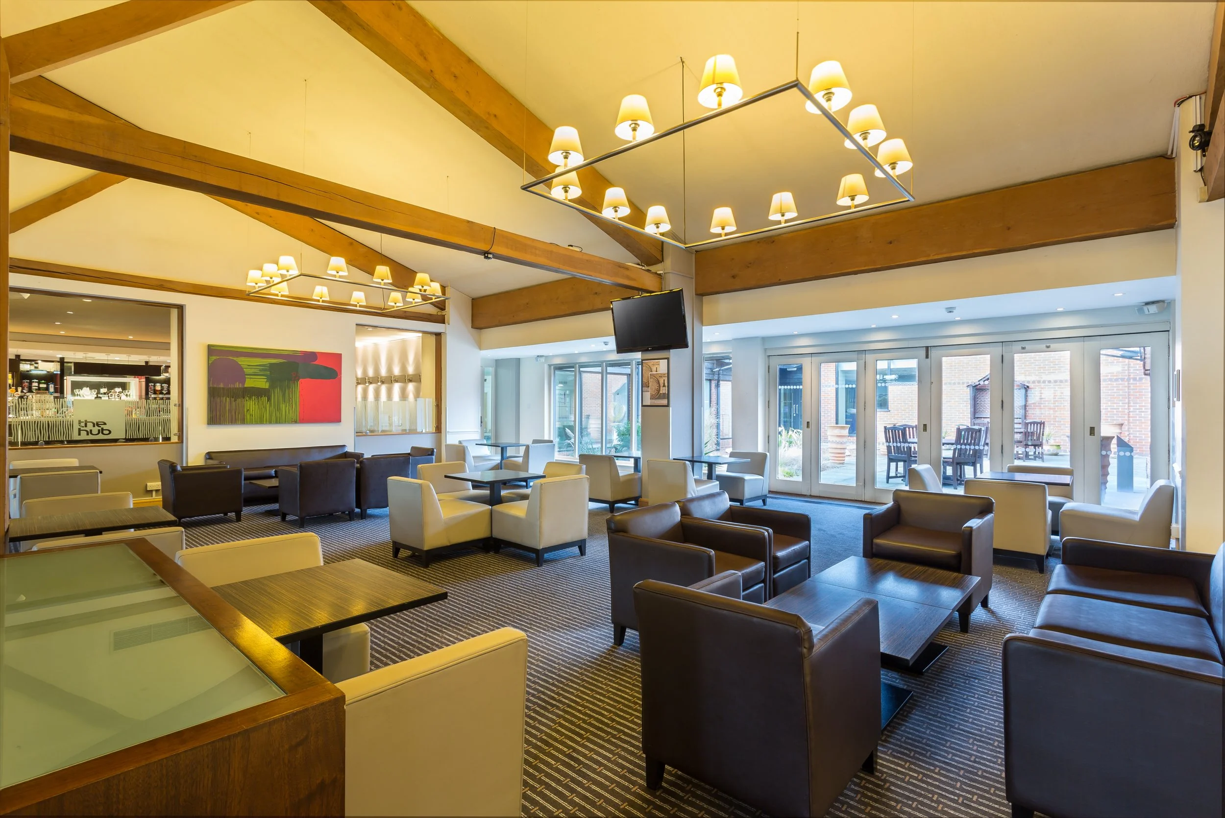 Lobby lounge seating at Holiday Inn hotel in Cambridge, Cambridgeshire