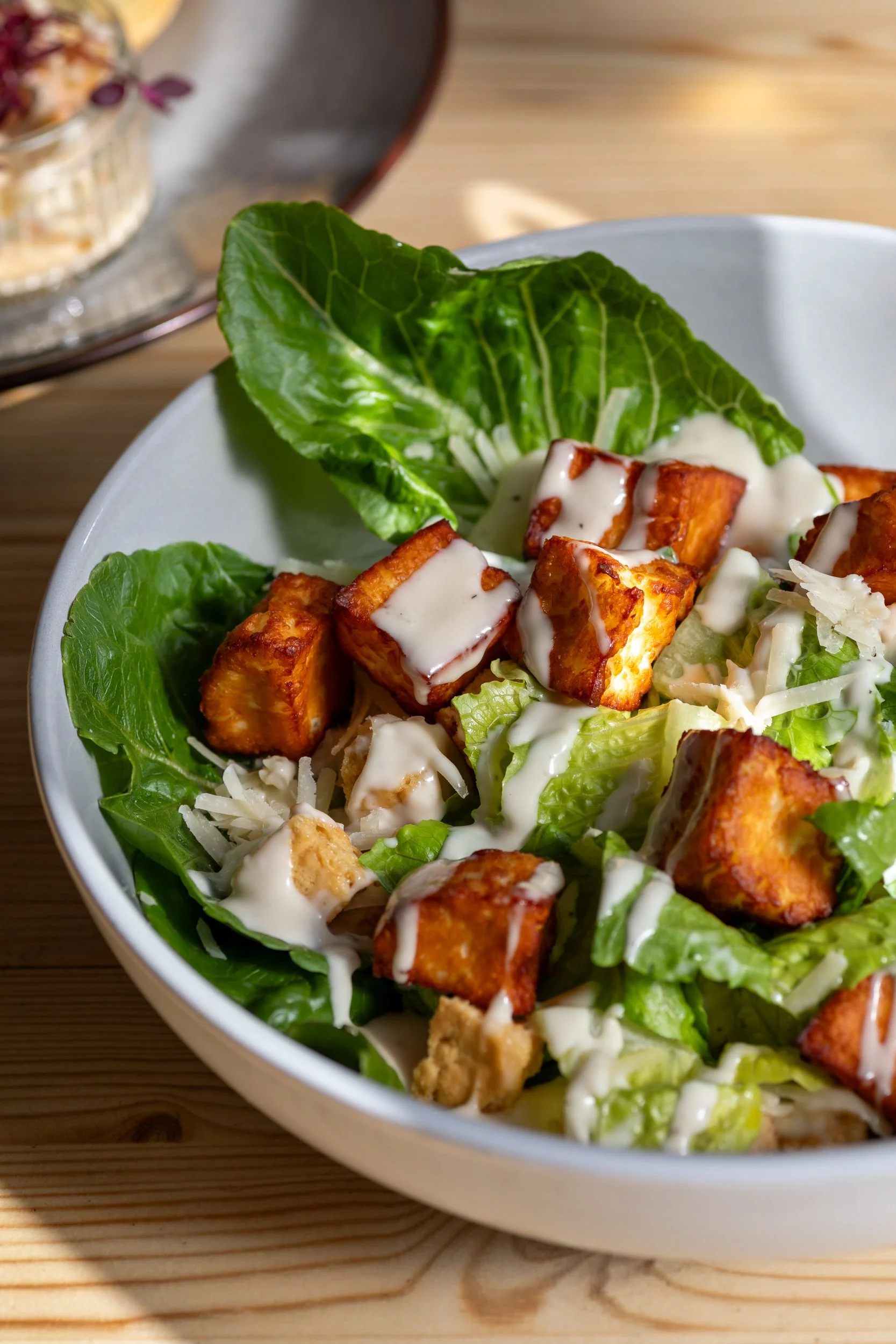 Close up of halloumi caesar salad at The Folly Wine Bar in Petersfield, Hampshire. Food photography by Sequoia Studios.