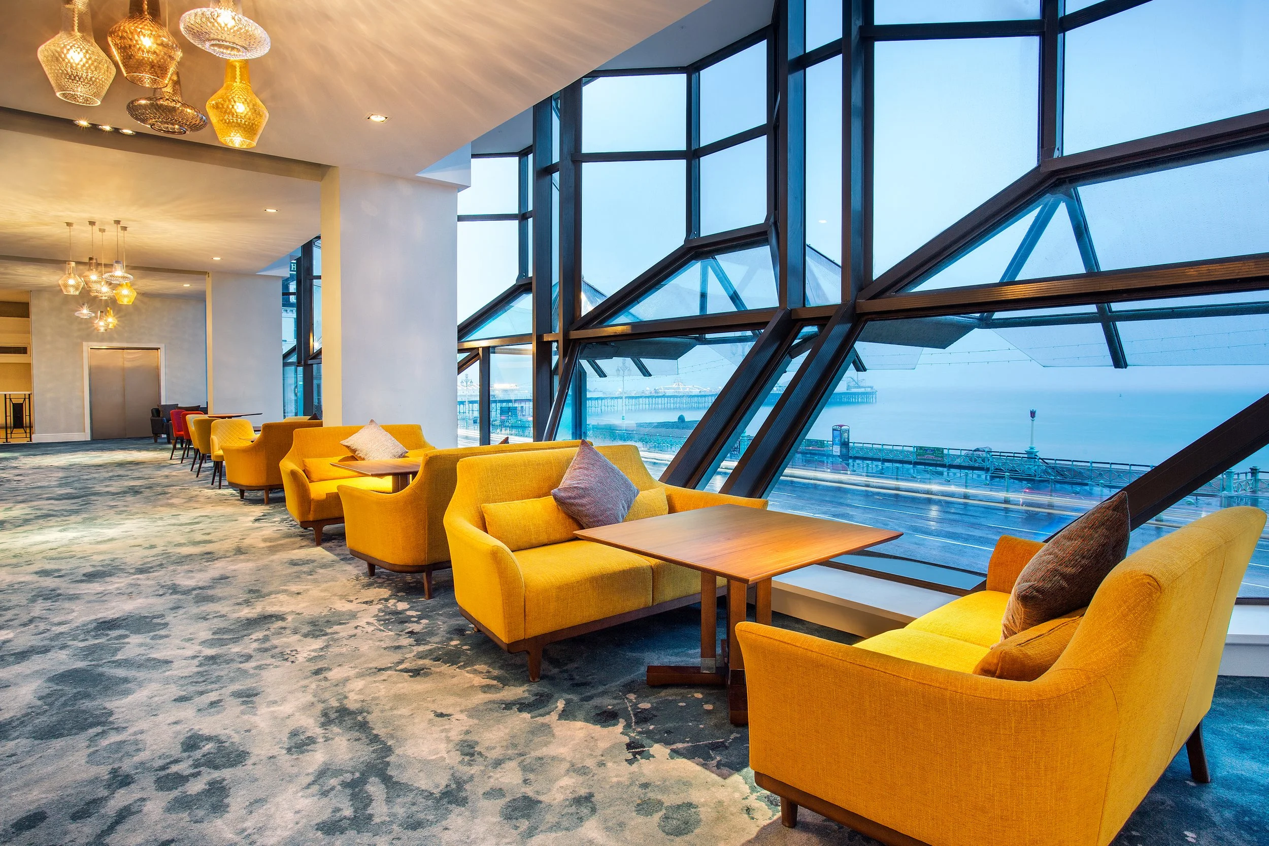 Promenade lounge seating with sea view at Jurys Inn hotel in Brighton