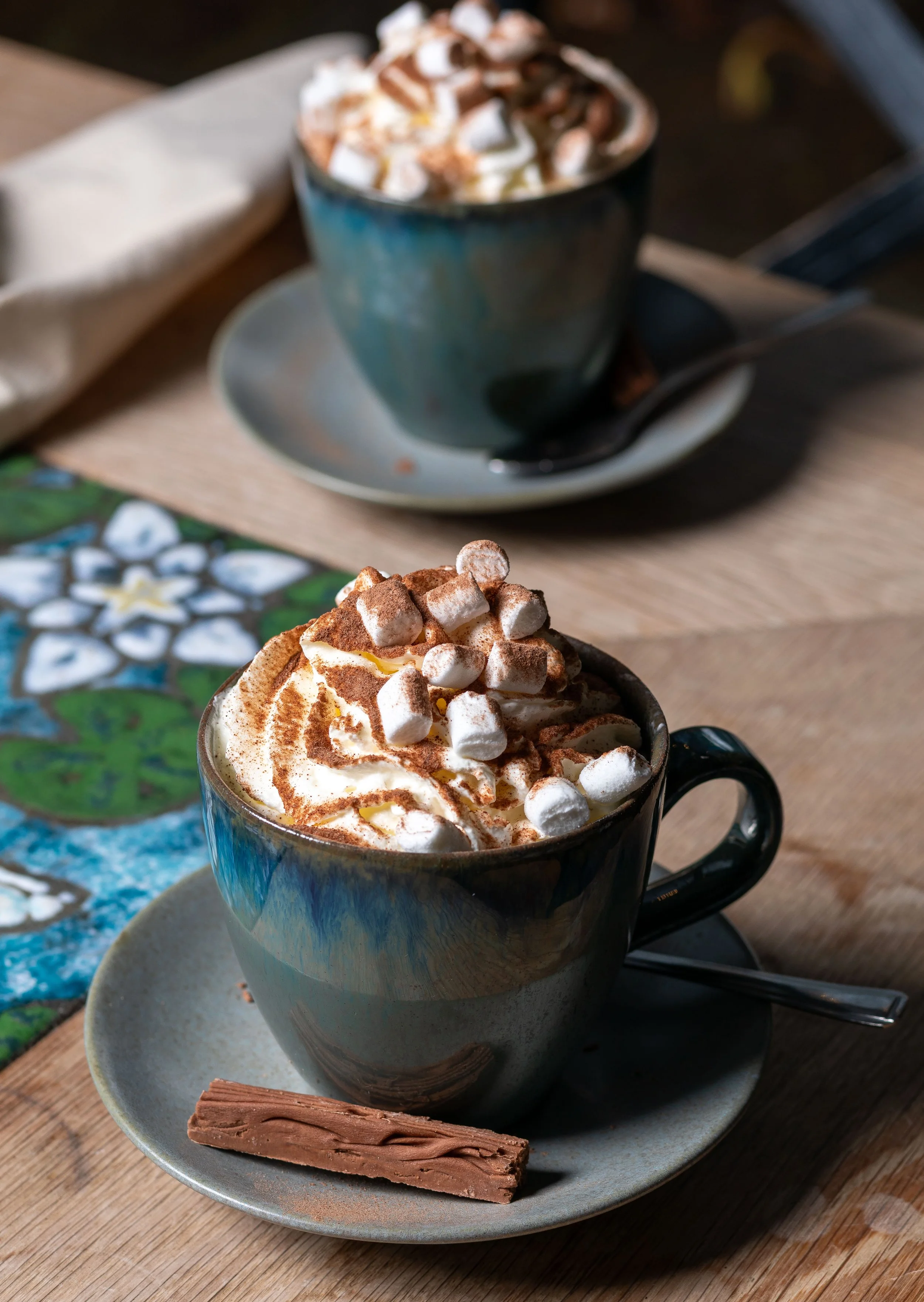 Hot chocolates with marshmallows at The Kiln Cafe served in cups made at Grayshott Pottery