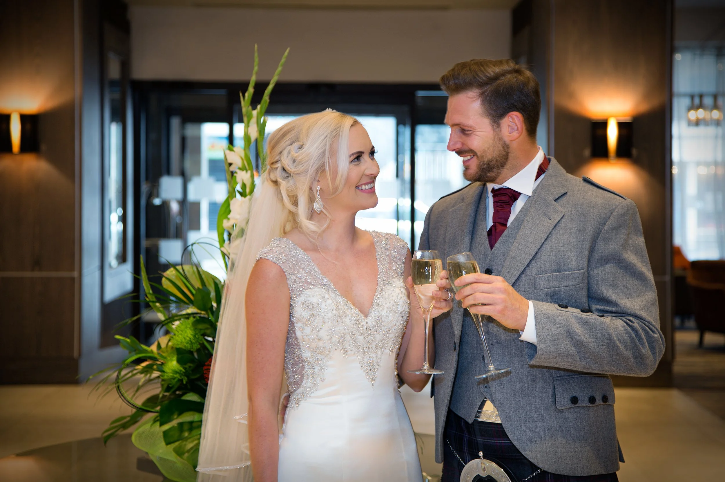 bride-groom_champagne-reception_doubletree-hilton-glasgow_wedding-venue-photographer-surrey.jpg