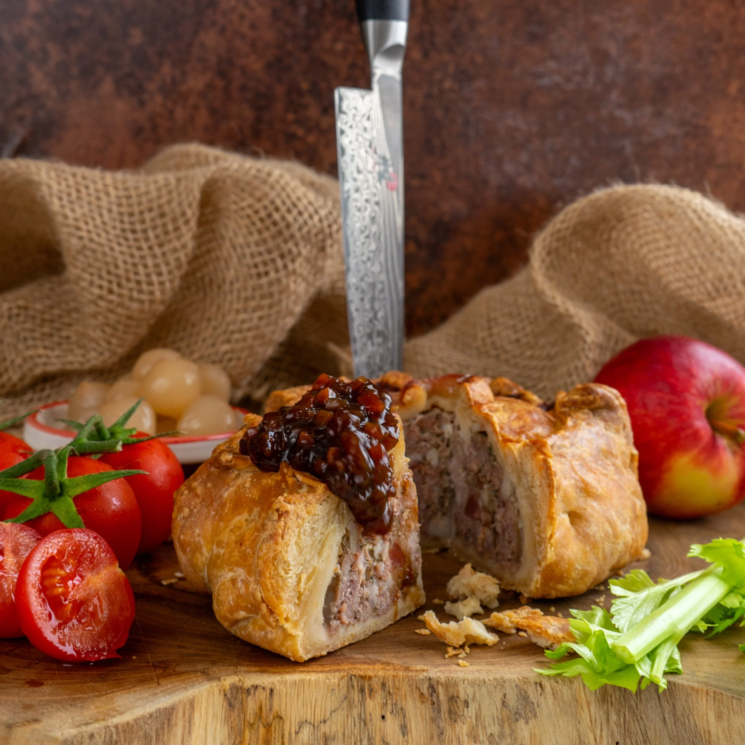 pork-pie-ploughmans-lunch-with-sharp-knife.jpg