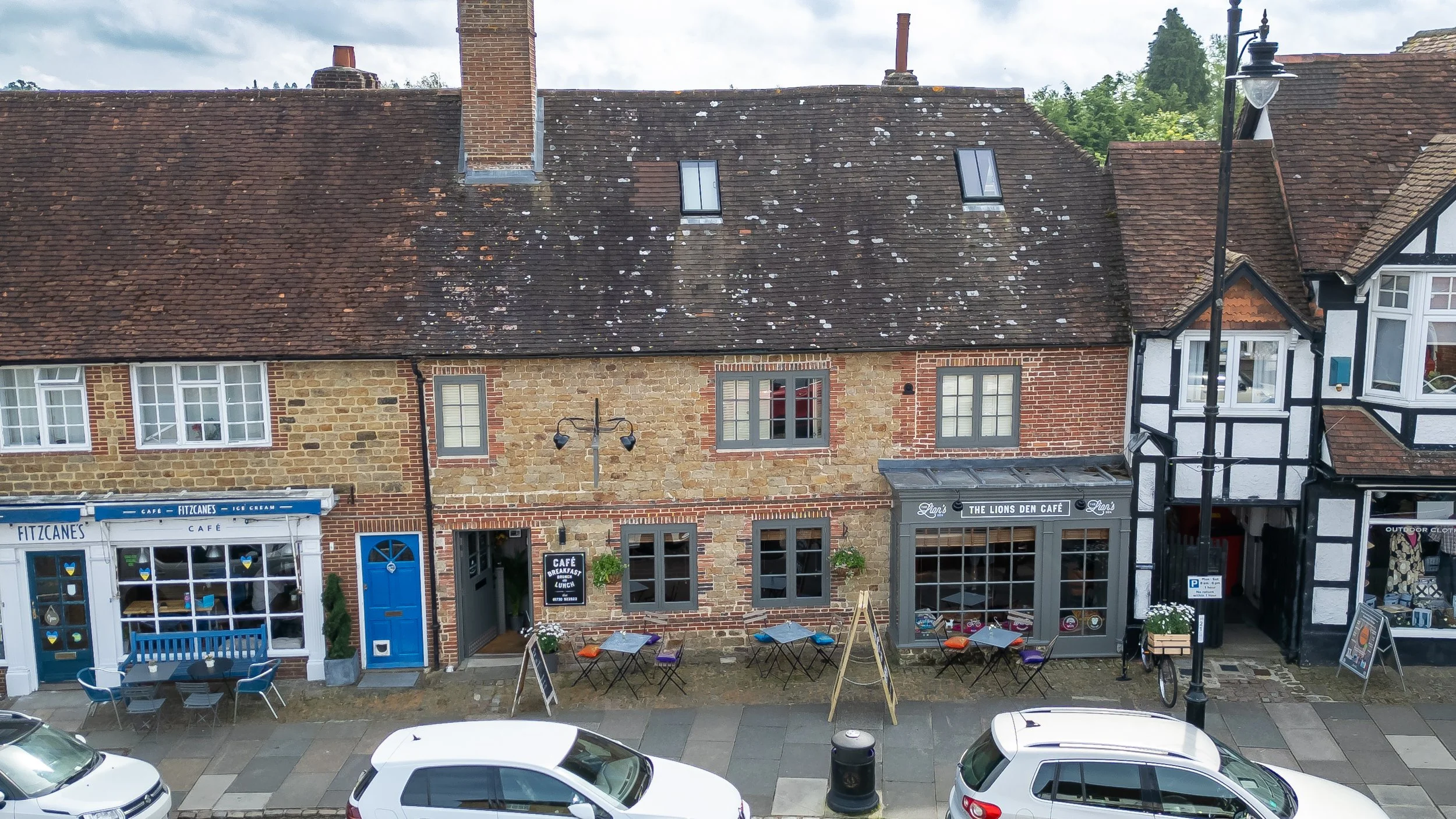 Landscape drone shot of café exterior – The Lion's Den Midhurst – Hospitality Venue Photography by Sequoia Studios