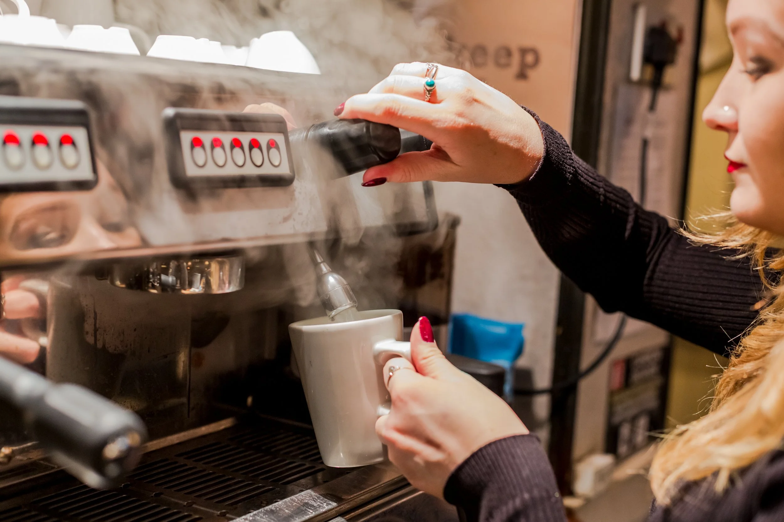 female-barista-making-coffee-rising-sun-milland-001.jpg