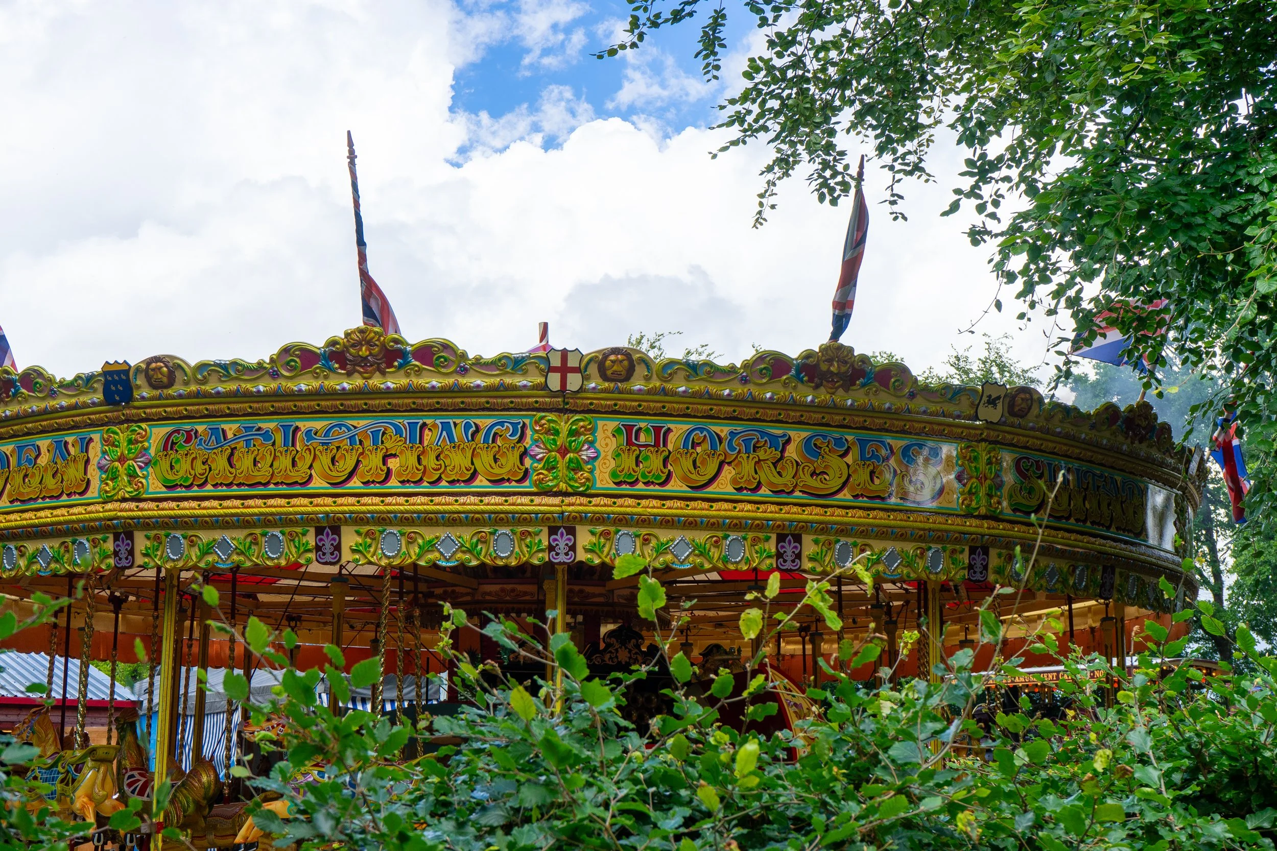 Steam-powered merry-go-round ride – Hollycombe Steam In The Country – Event Photography by Sequoia Studios