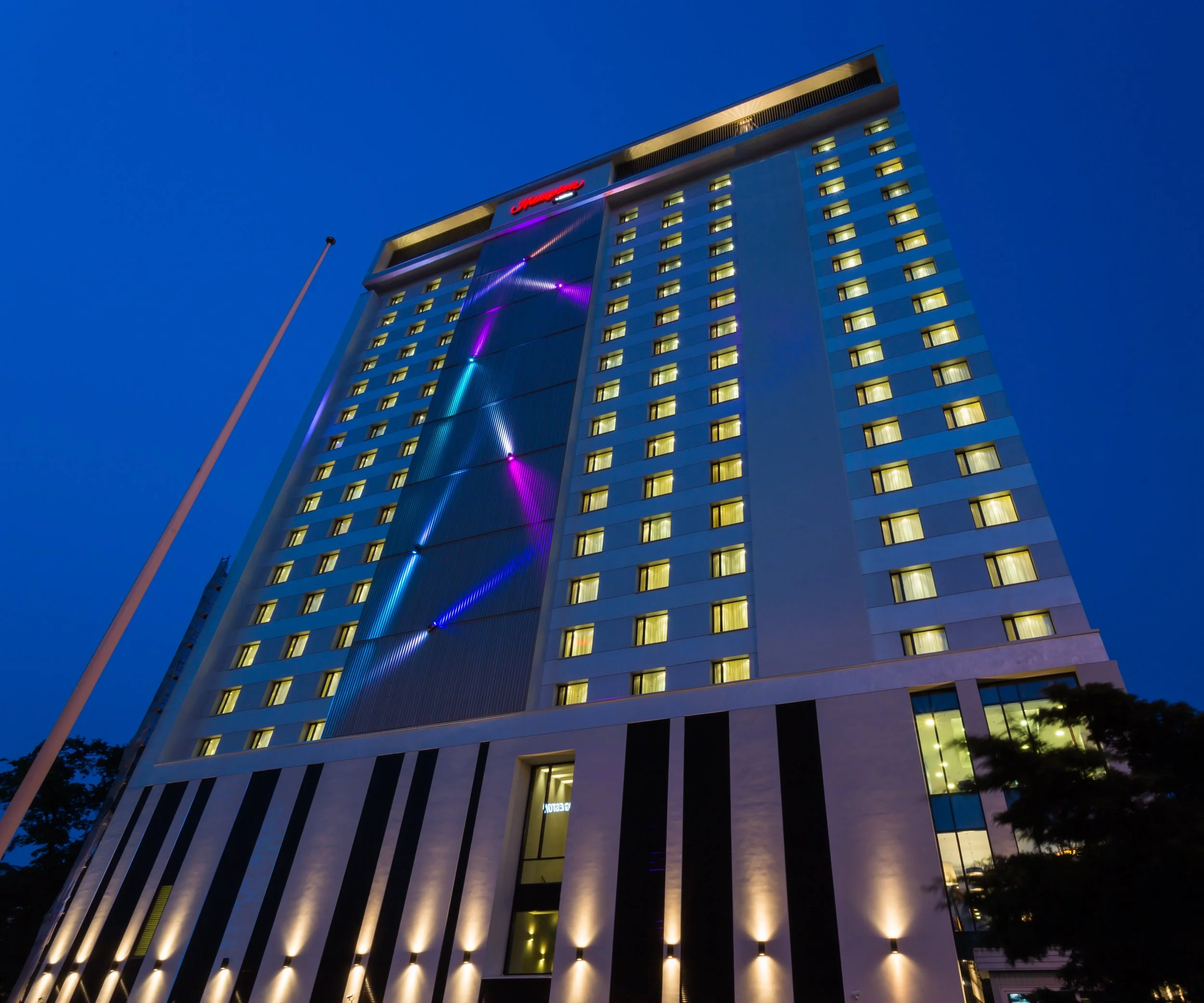 Extreme low angle evening exterior shot of Hampton by Hilton in Warsaw, Poland
