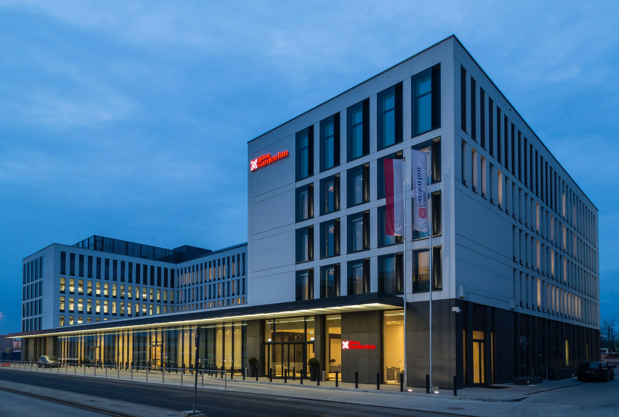 Evening exterior of Hilton Garden Inn hotel in Krakov, Poland