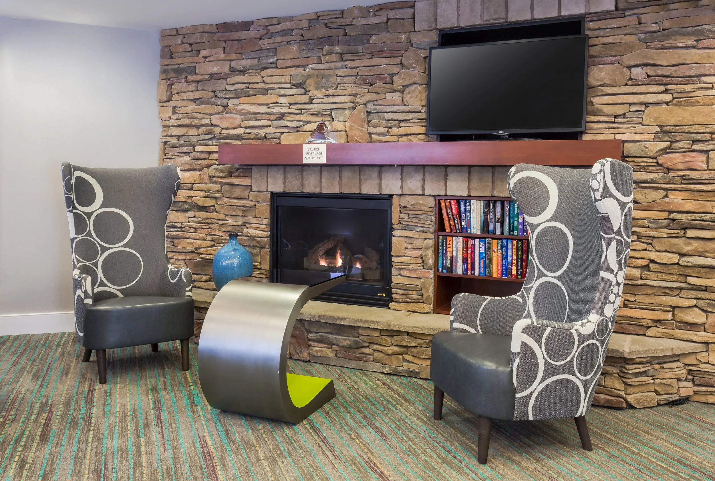 Lobby lounge fireplace seating at Residence Inn, Rocky Hill, Connecticut, USA
