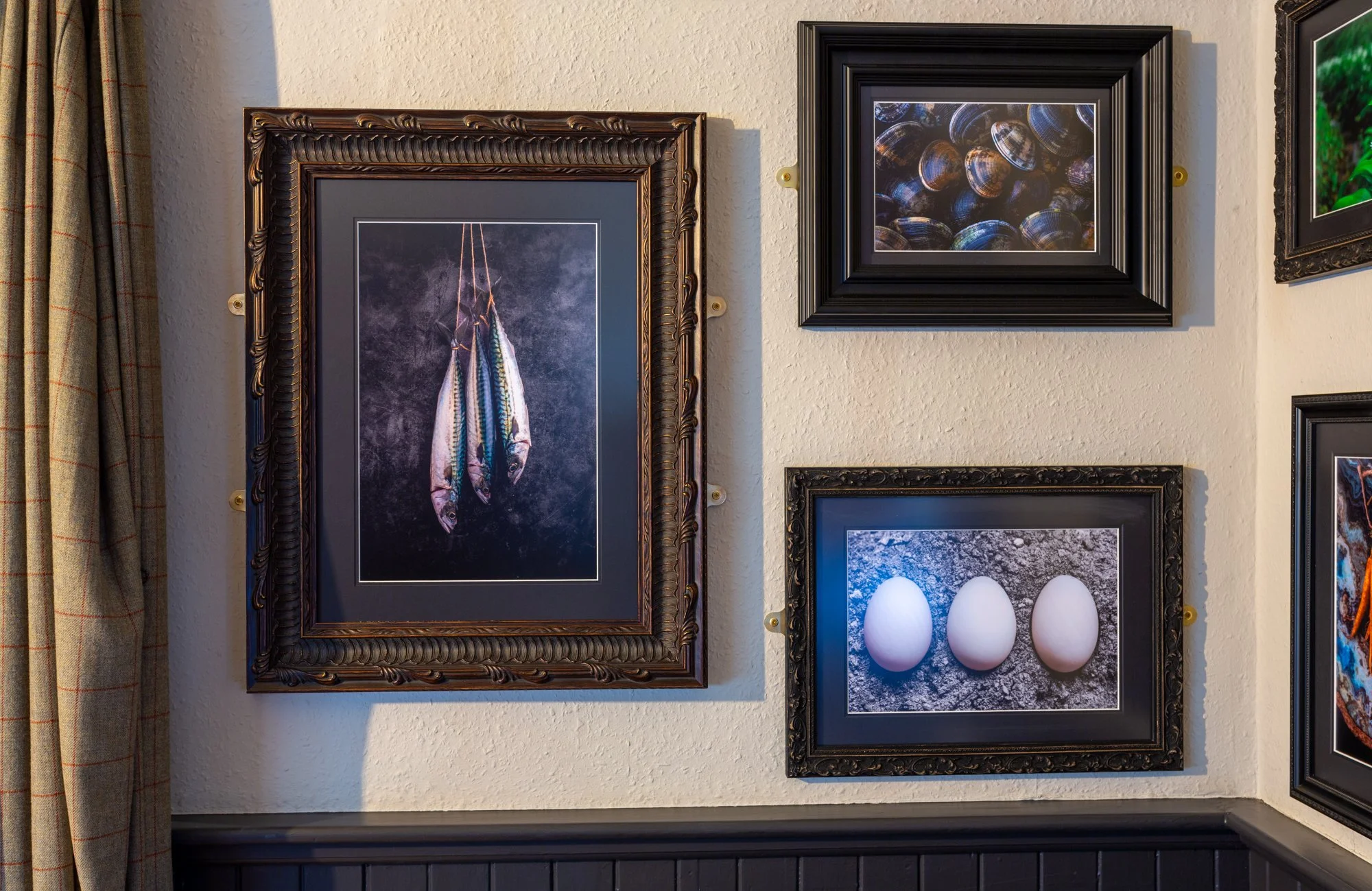 A wall of the dining room at The Rising Sun, Milland with fine art food photography by Sequoia Studios