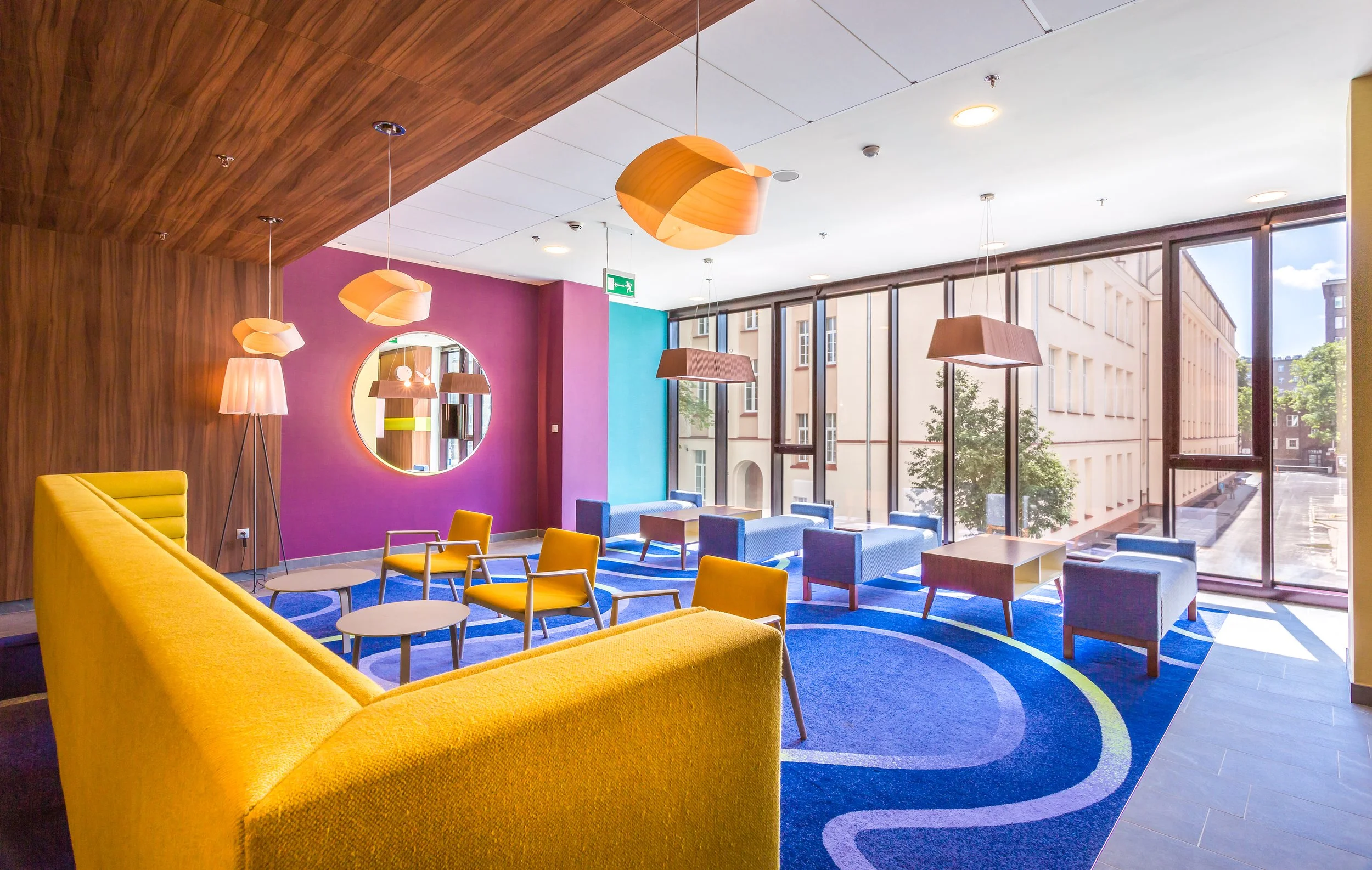 Reception area lounge at Hampton by Hilton in Warsaw, Poland