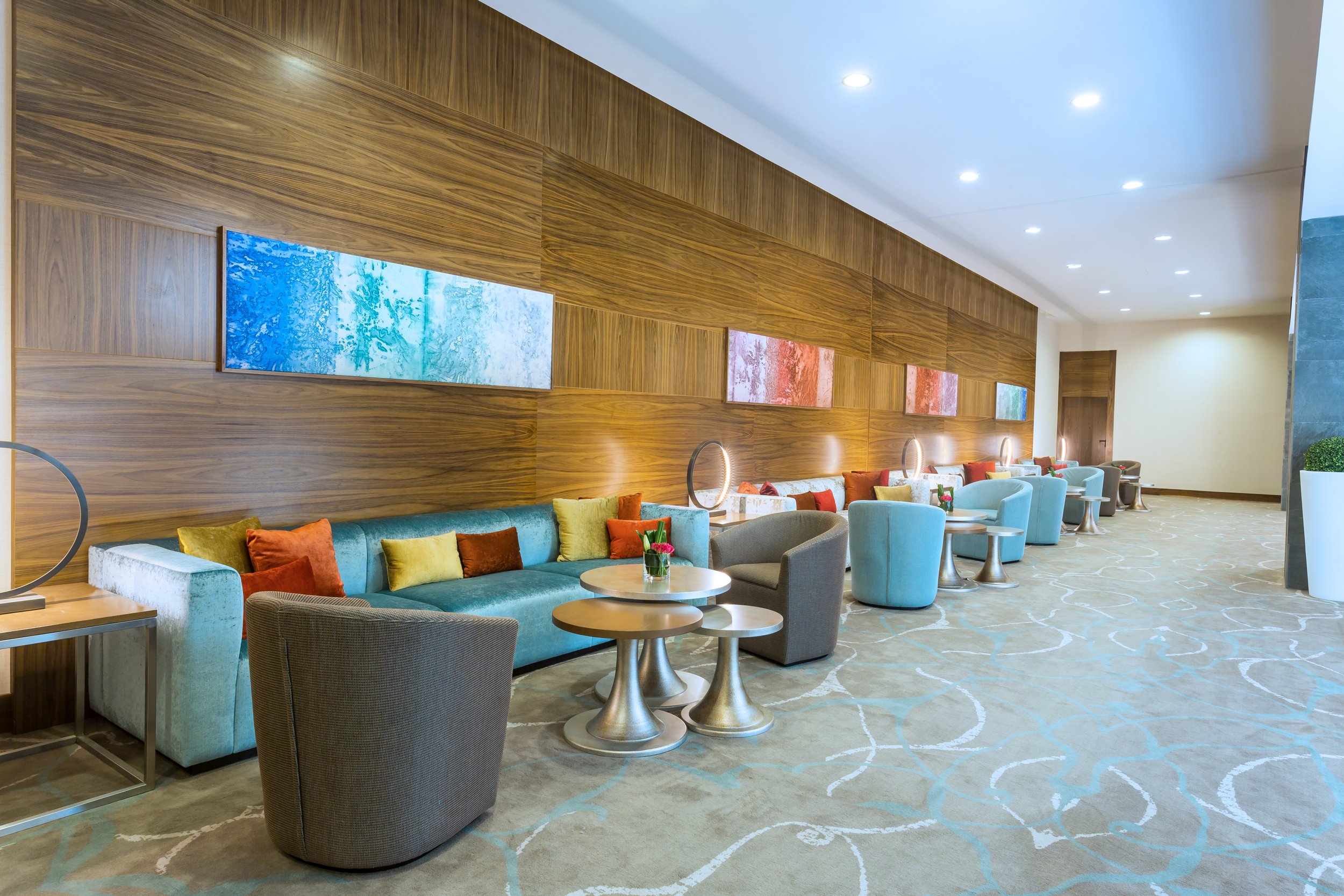 Wide angle of mezzanine floor lounge seating at Hilton Garden Inn hotel in Tangier, Morocco