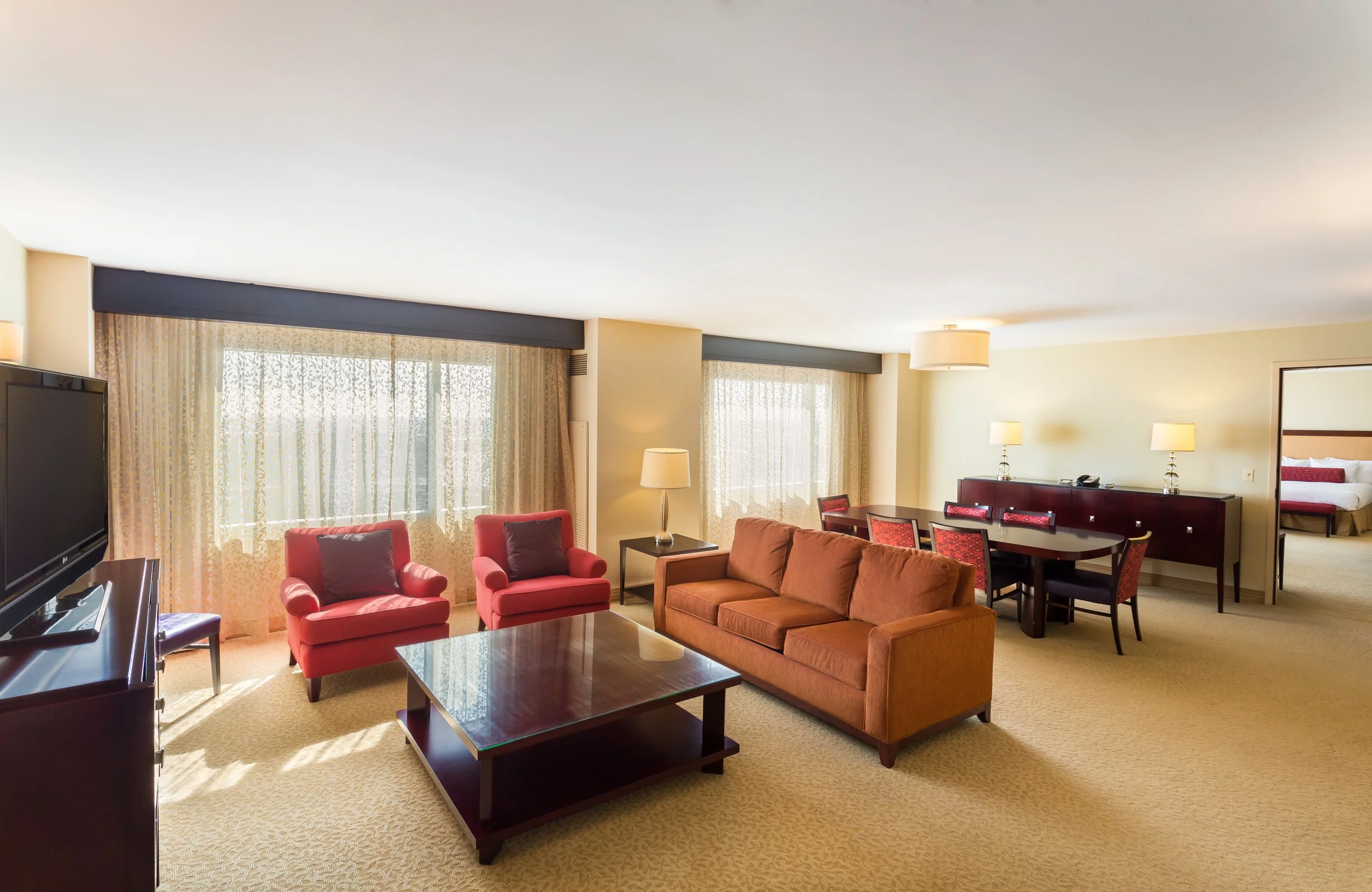 executive-suite-lounge-sheer-curtains-drawn-hilton-baltimore-usa.jpg