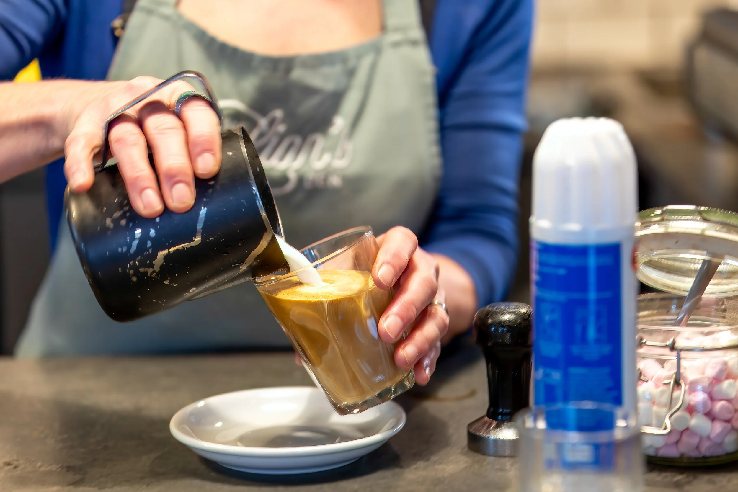 Latte coffee being poured  – The Lion's Den Café, Haslemere, Surrey – Drink Photography by Sequoia Studios