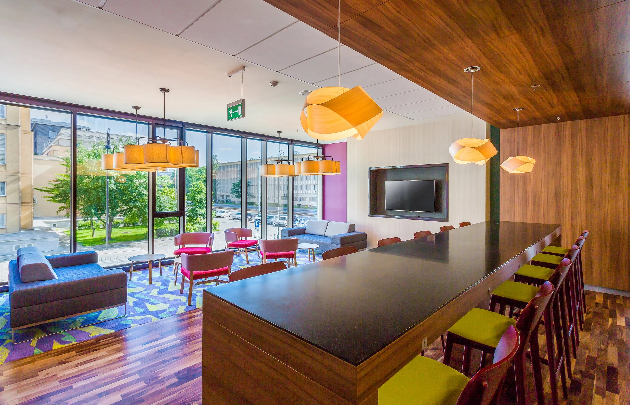 Business hub and lounge area at Hampton by Hilton in Warsaw, Poland
