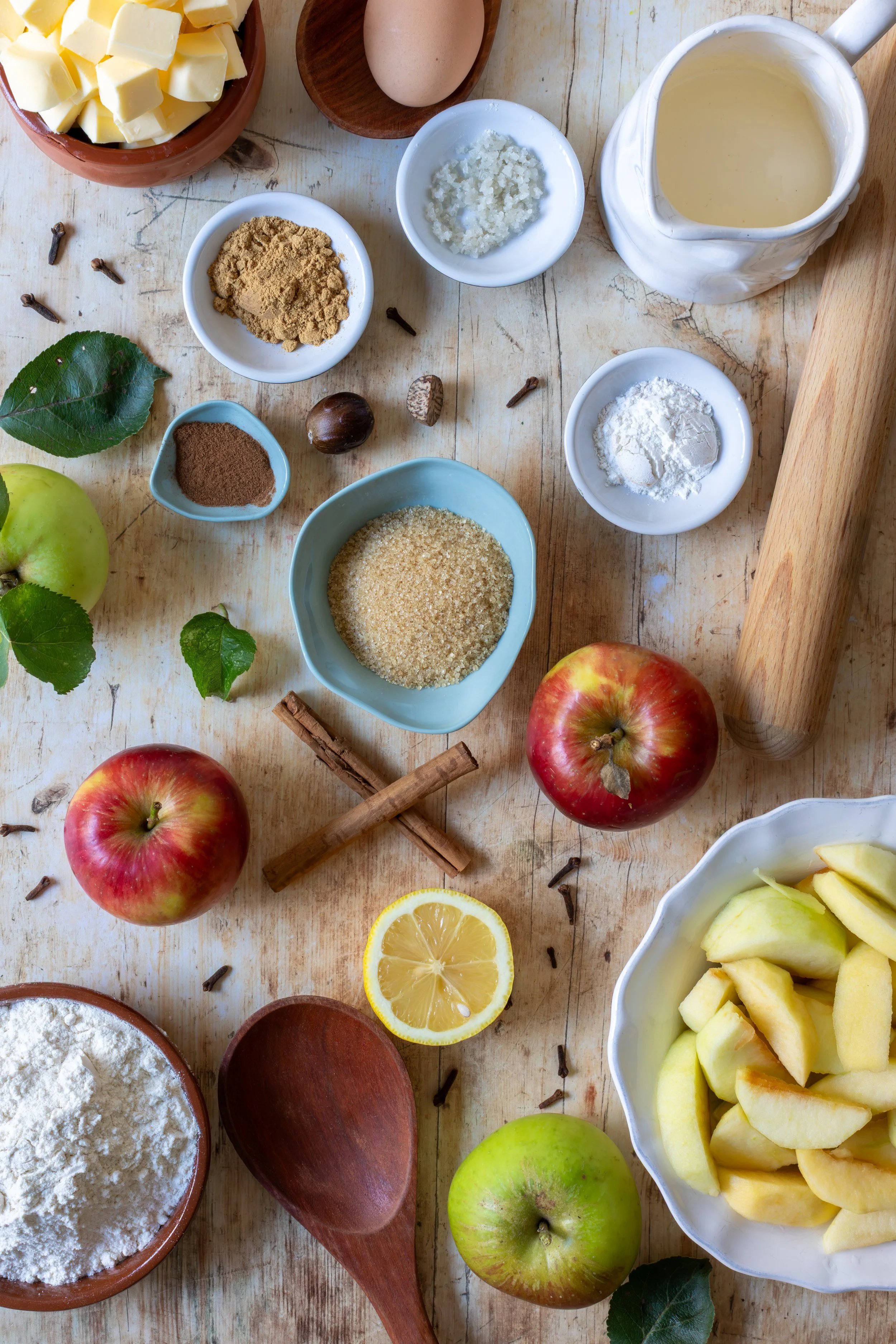 Flat lay of ingredients for homemade apple pie