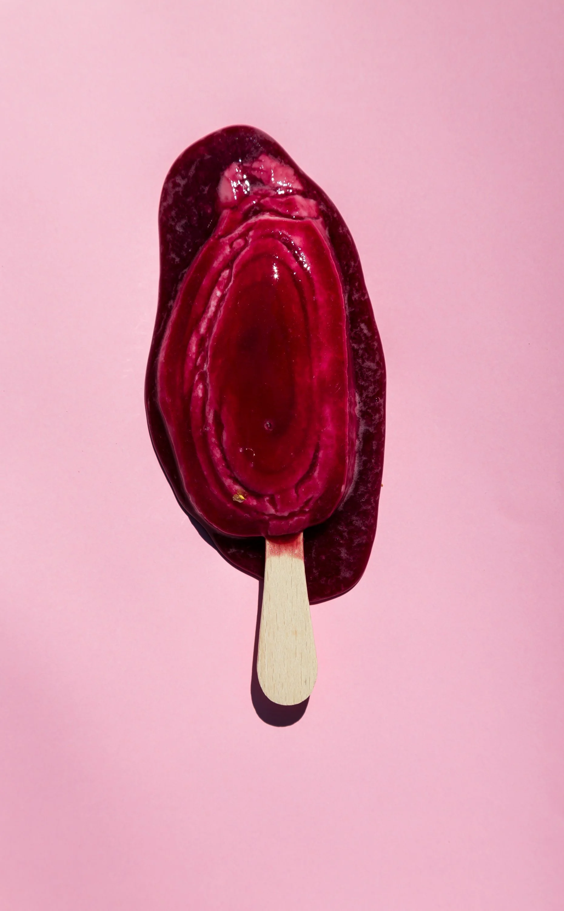 melting-solero-ice-lolly-pink-background.jpg