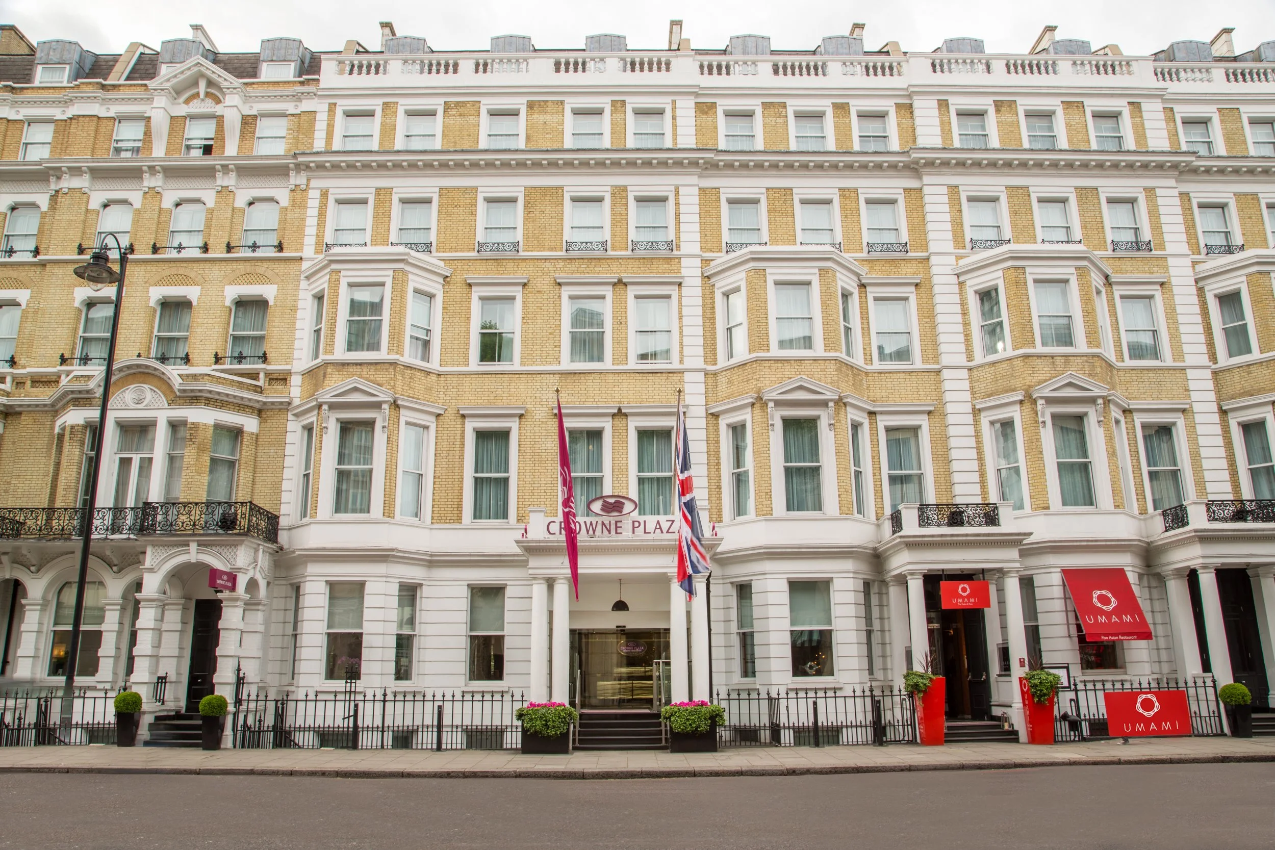 Daytime exterior of Crowne Plaza hotel in Kensington, London