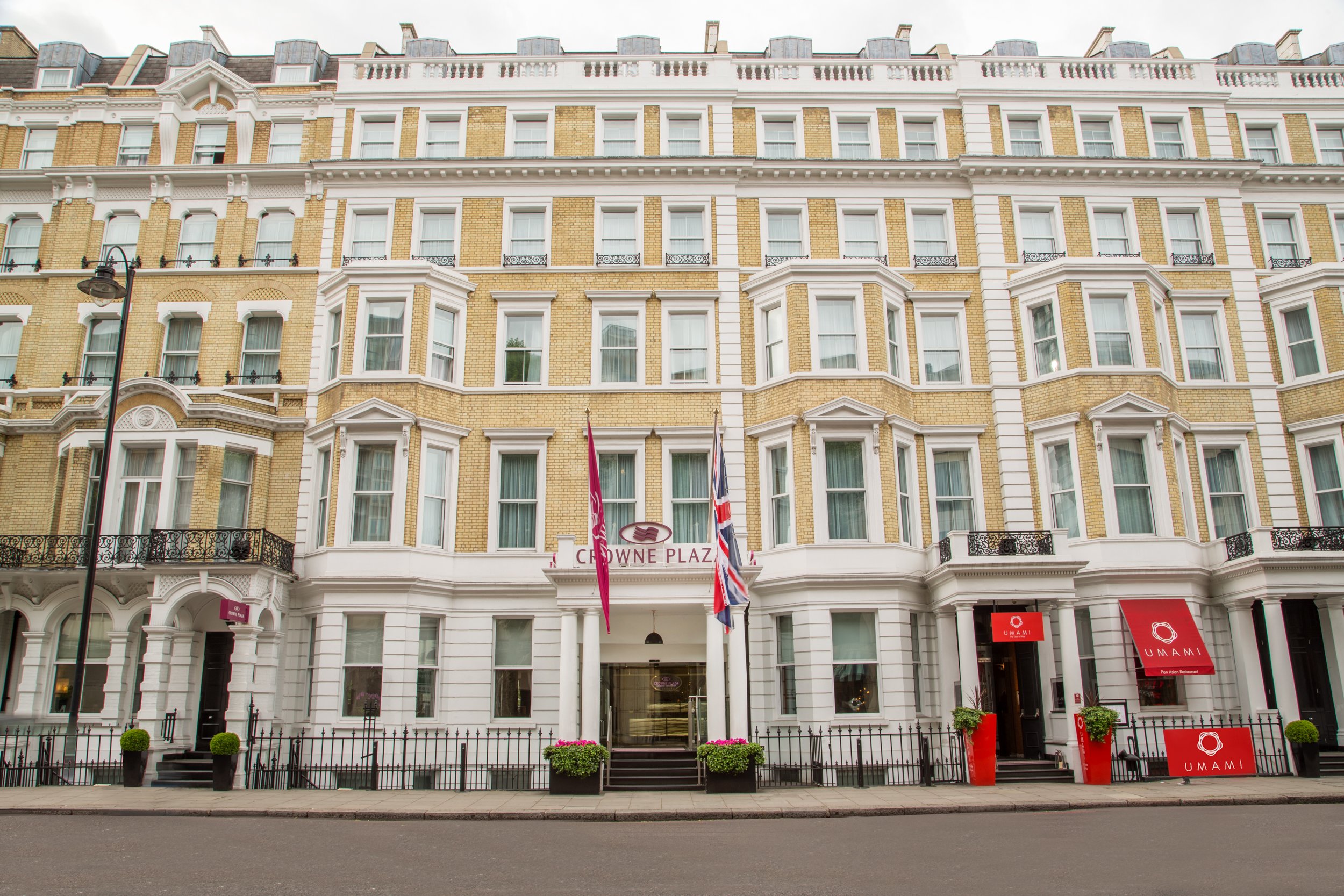 Daytime exterior of Crowne Plaza hotel in Kensington, London