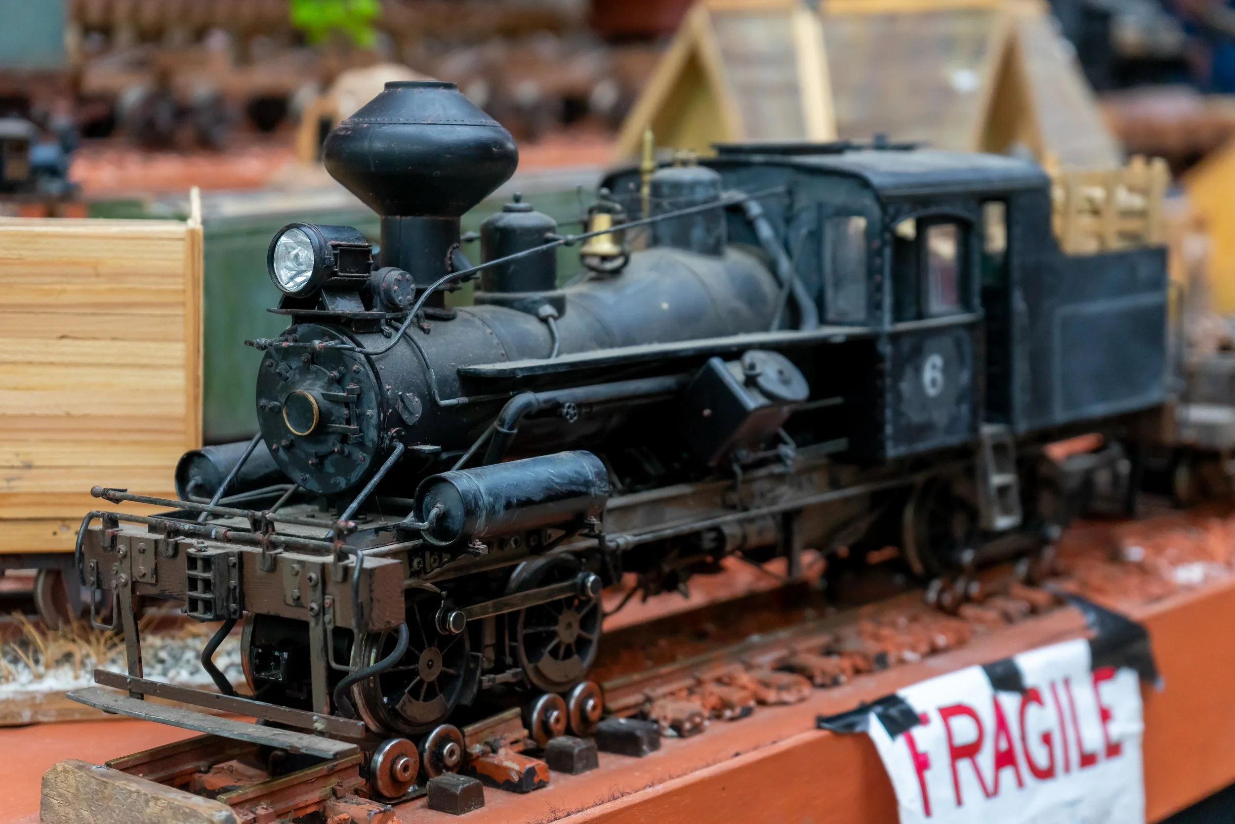 Model train on Broke Brick Mountain exhibit – Hollycombe Mega Model Weekend – Event Photography by Sequoia Studios