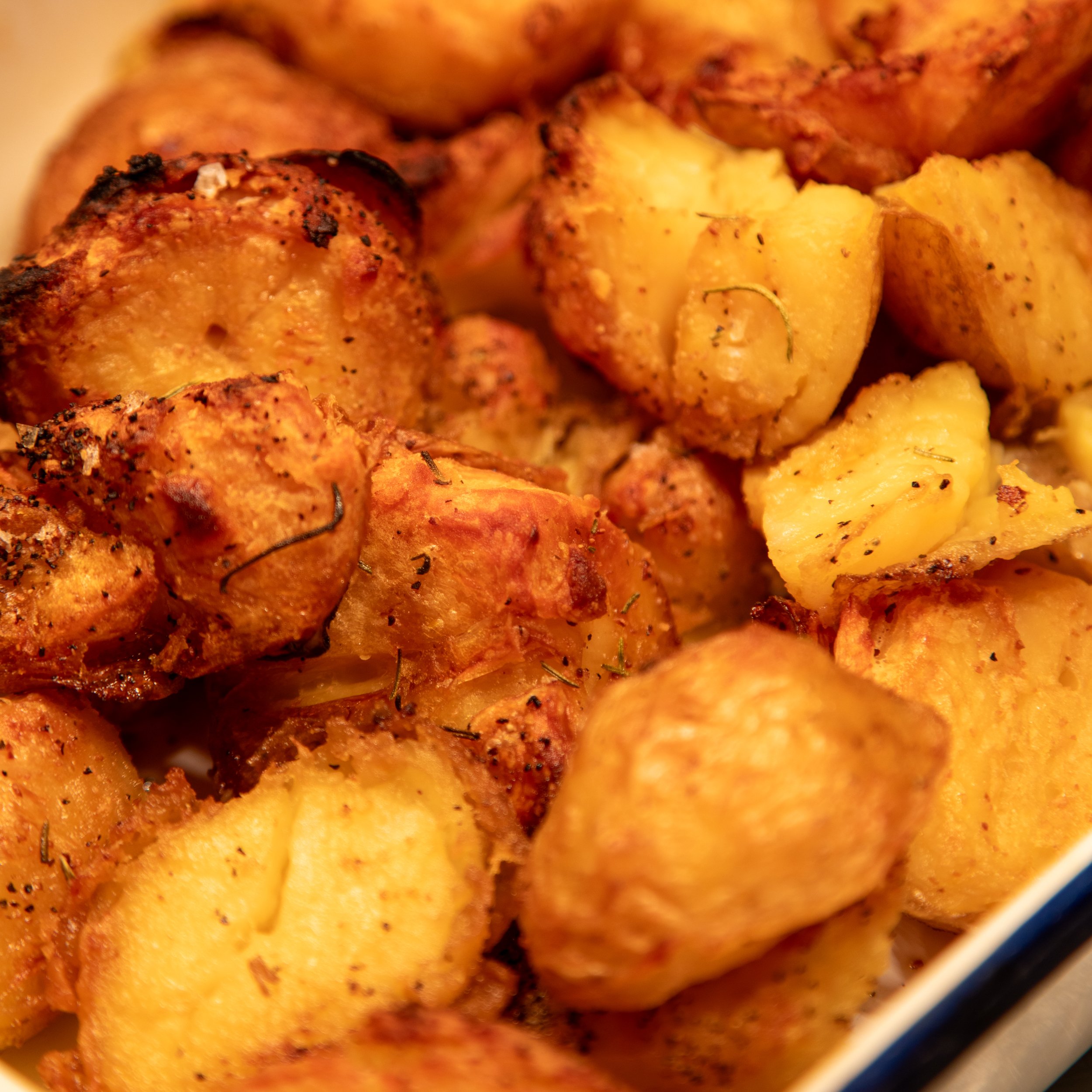 Roast potatoes at The Folly Wine Bar carvery in Petersfield, Hampshire. Food photography by Sequoia Studios.