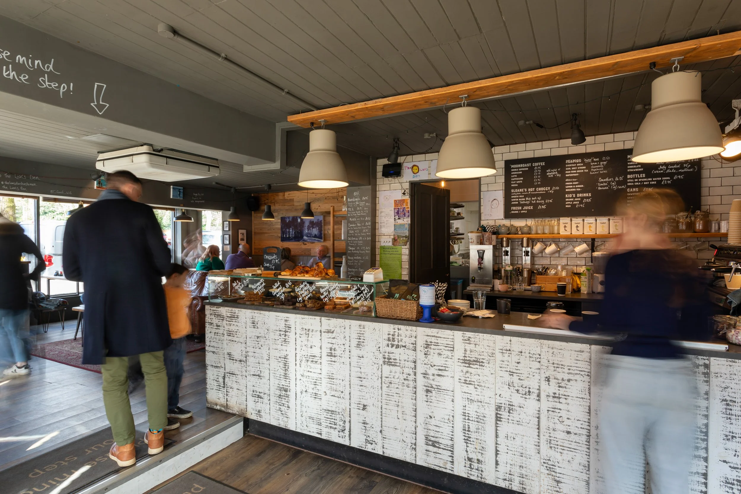 Staff and customers in action with motion blur – The Lion's Den Café, Haslemere, Surrey – Hospitality Venue Photography by Sequoia Studios