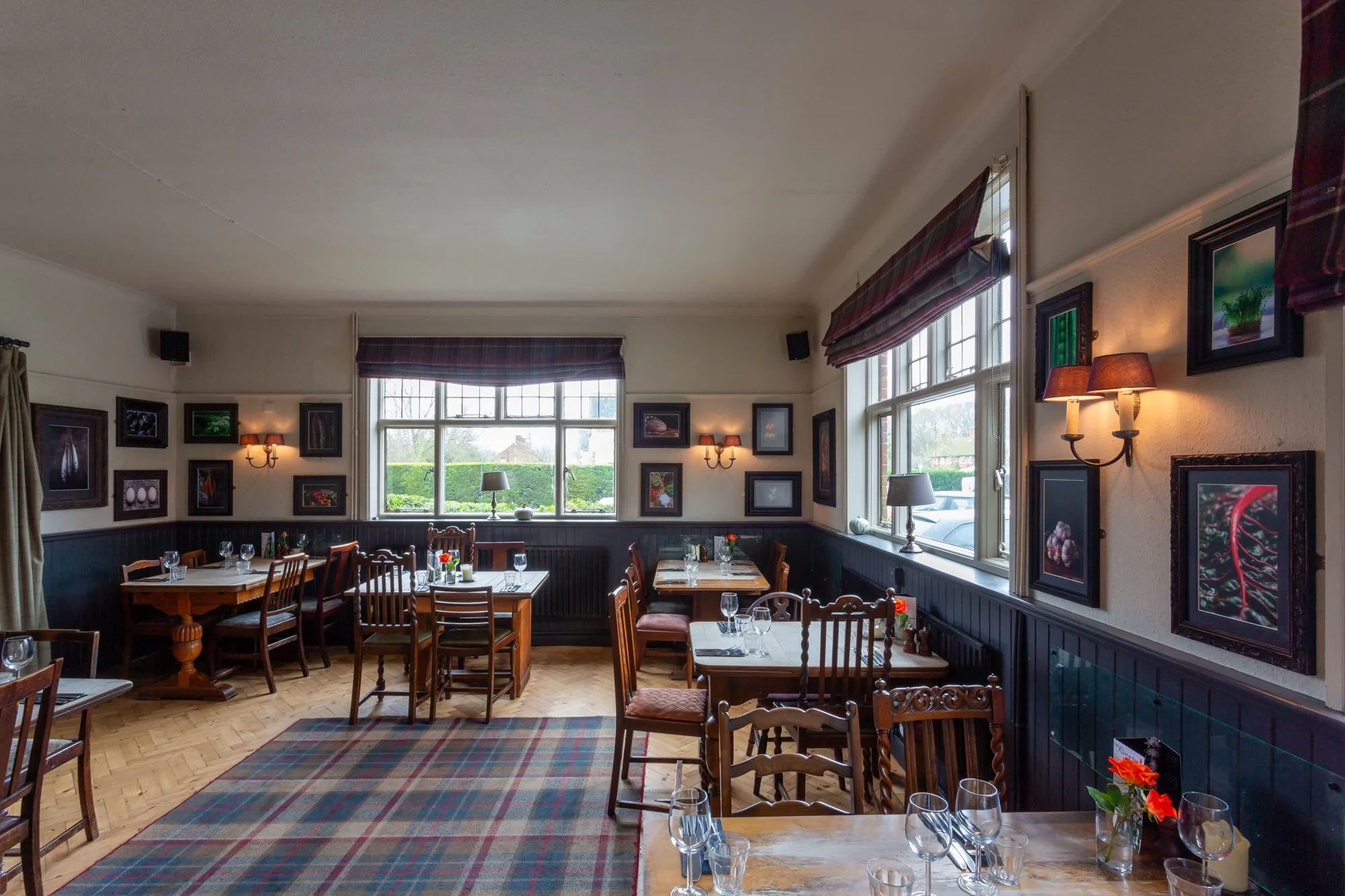 Wide angle of the dining room at The Rising Sun, Milland with fine art food photography by Sequoia Studios
