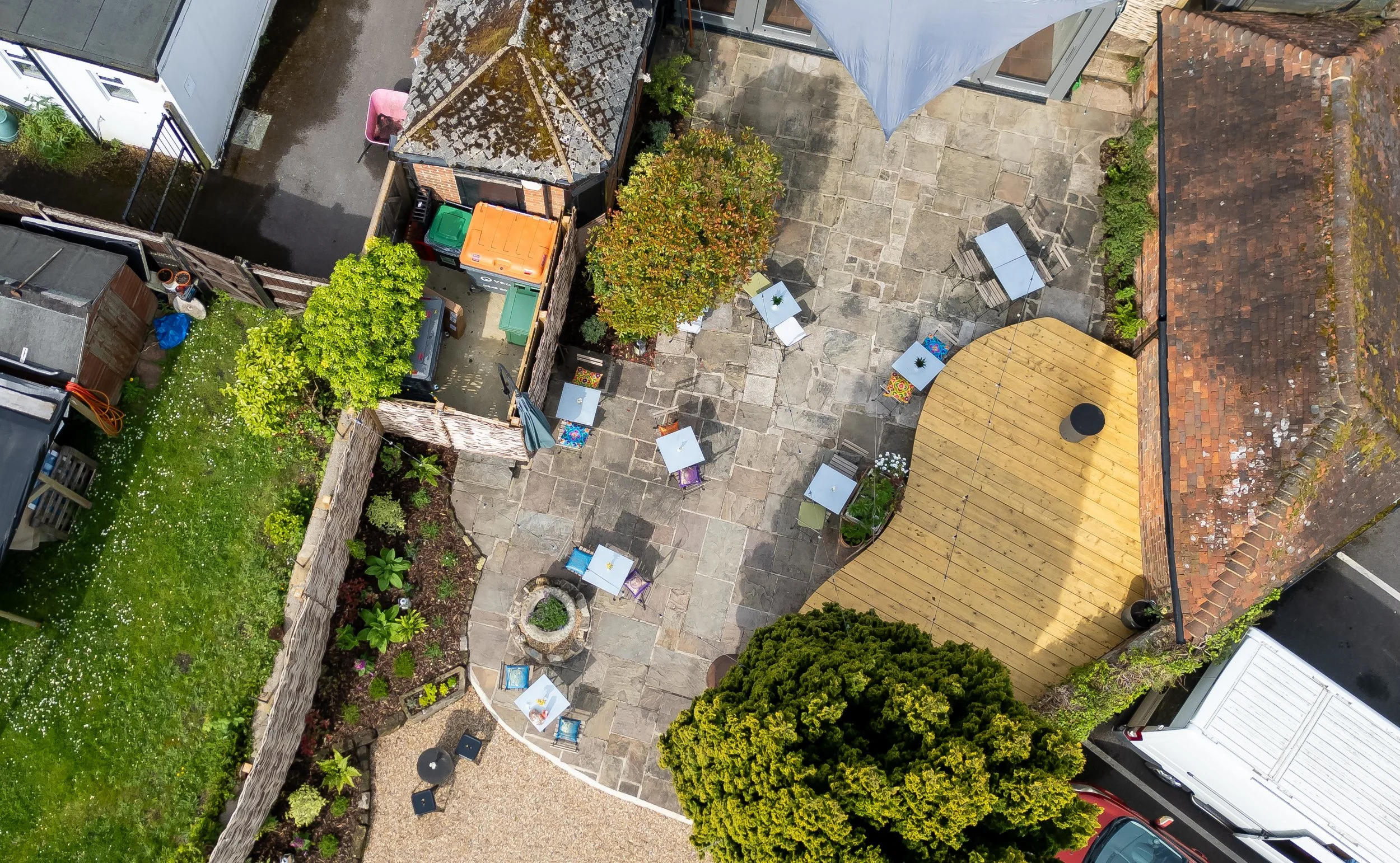 Overhead drone shot of the courtyard of The Lion's Den café in Midhurst, West Sussex