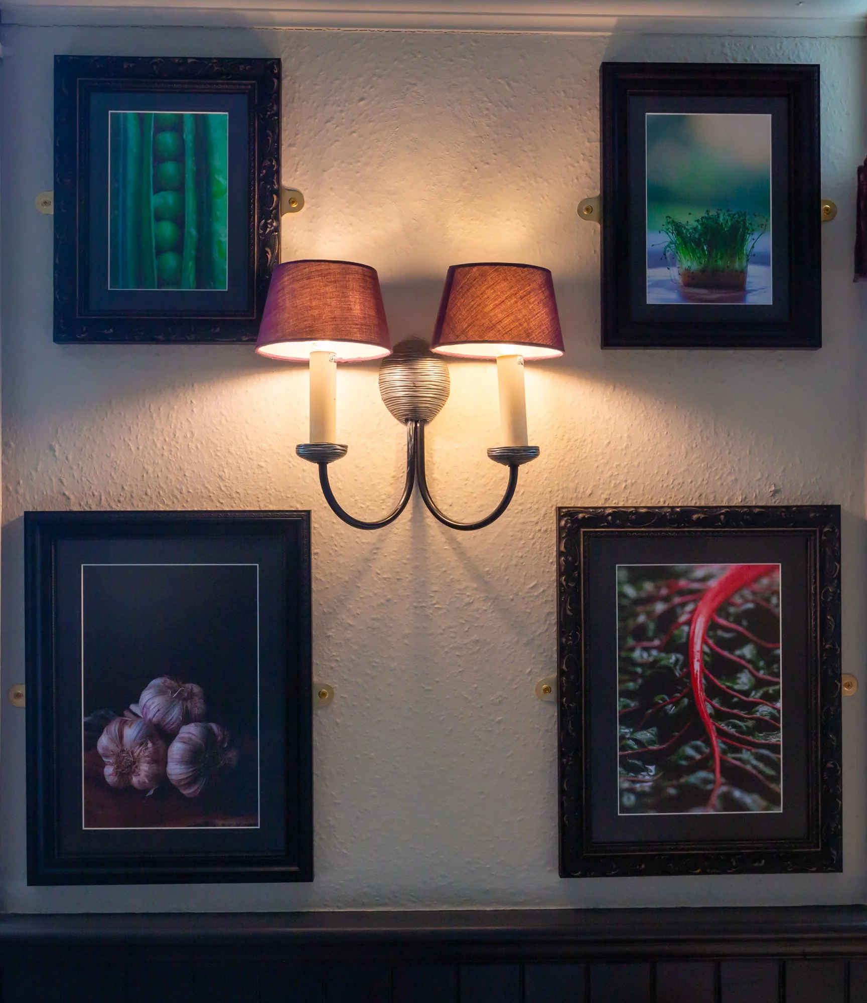 A wall of the dining room at The Rising Sun, Milland with fine art food photography by Sequoia Studios