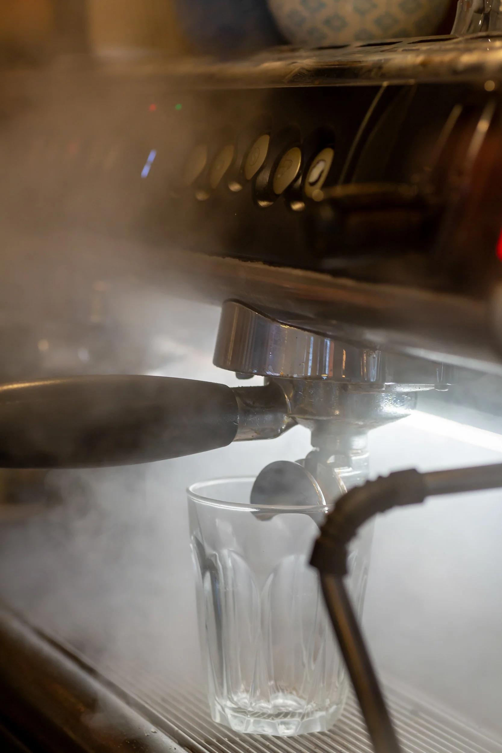 Steam action at the coffee machine  – The Lion's Den Café, Haslemere, Surrey – Hospitality Venue Photography by Sequoia Studios