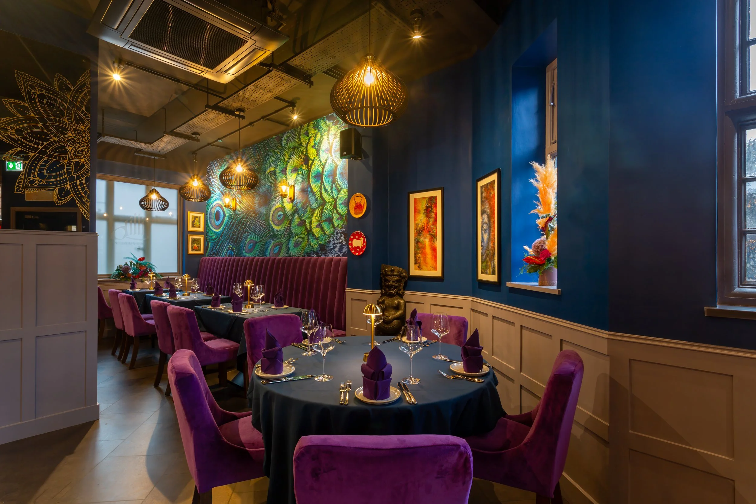 The peacock wallpaper and tables set for dinner – The Dilli, Haslemere – Restaurant Photography by Sequoia Studios