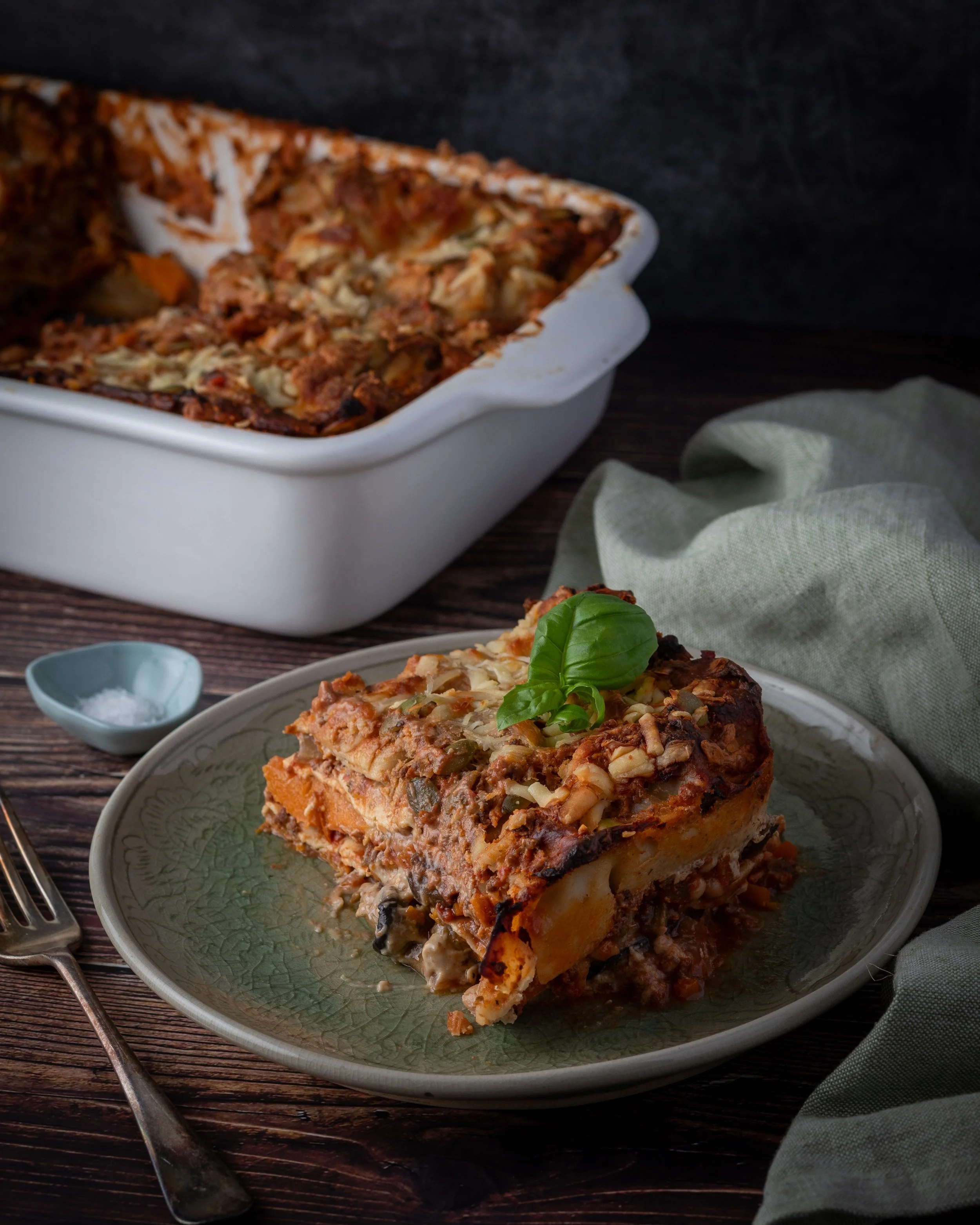 Autumn lasagne on green plate