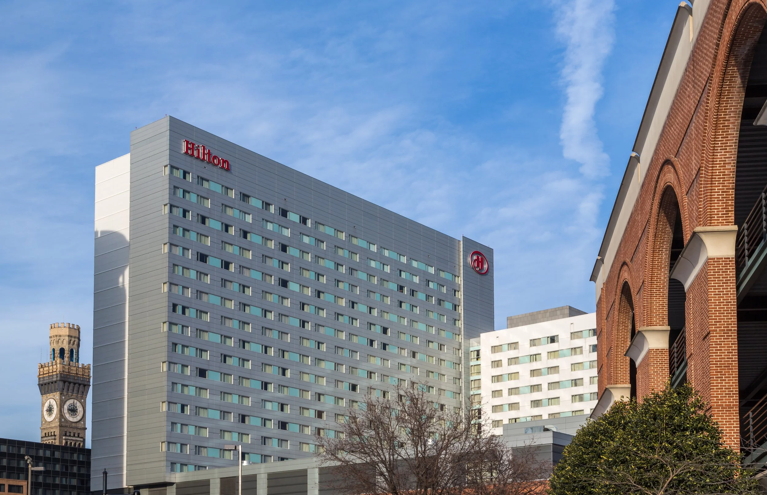Daytime exterior of Hilton hotel in Baltimore, Maryland, USA