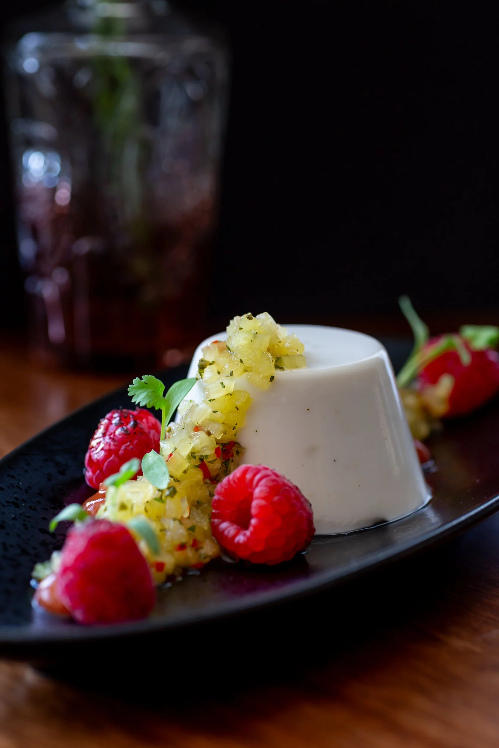 Tasty pannacotta with seared pineapple salsa and raspberries at The Wheatsheaf Inn Grayswood, Surrey – Pub Food Photography by Sequoia Studios