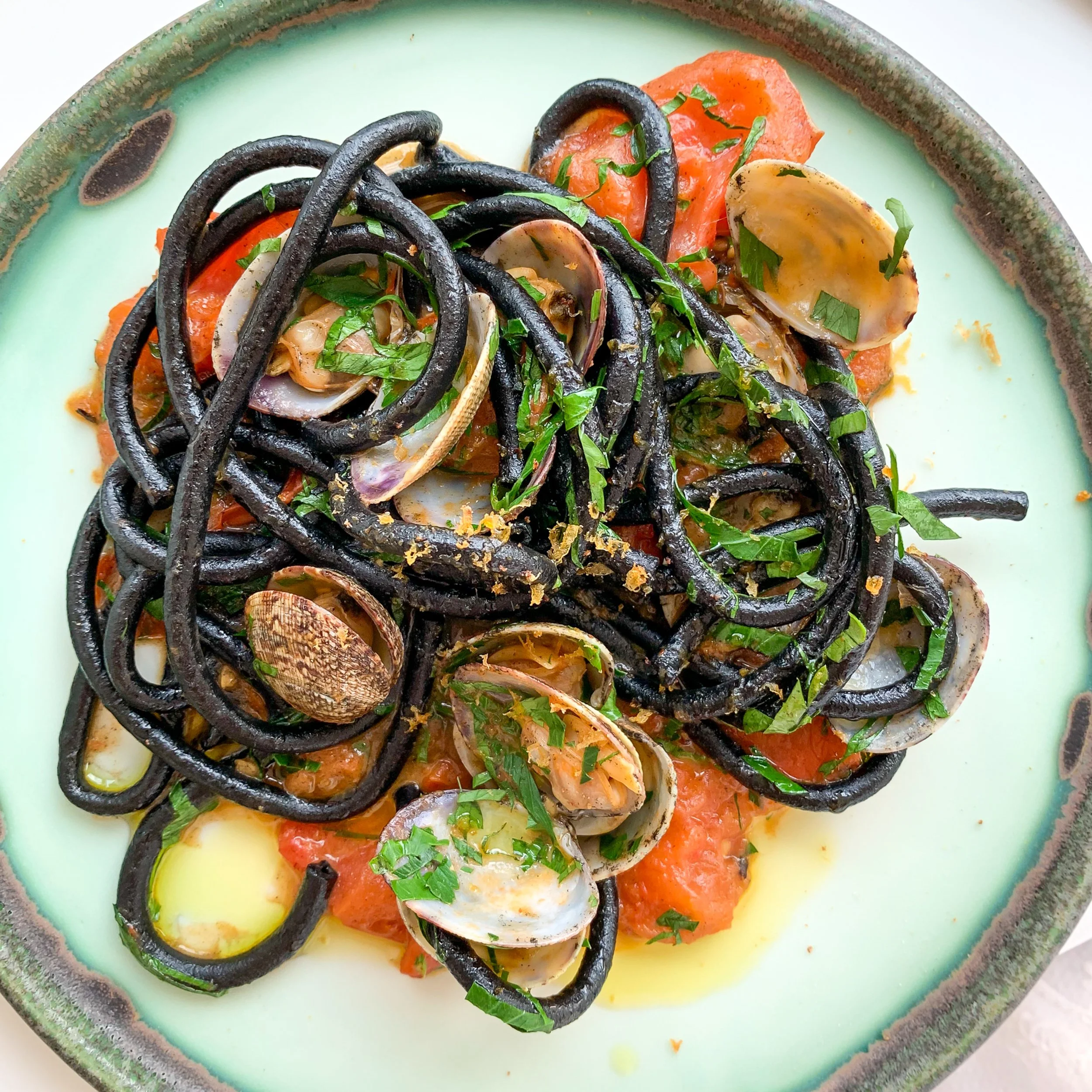 Squid ink spaghetti with clams