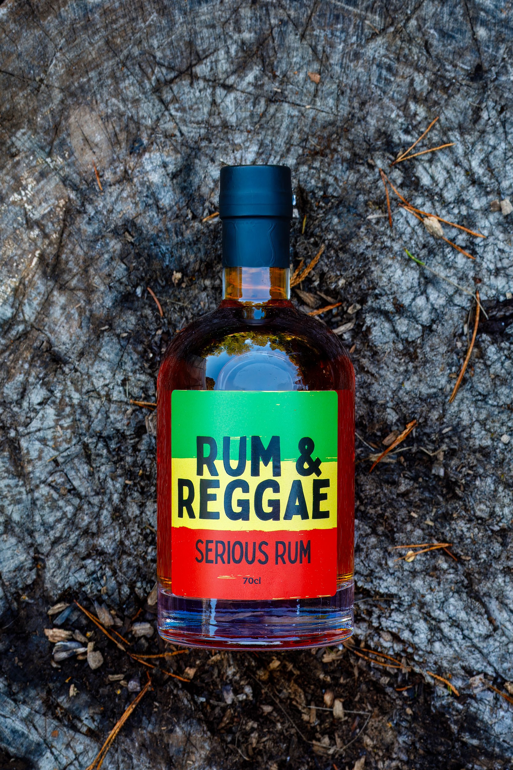 Rum &amp; Reggae Serious Rum product shot on tree stump