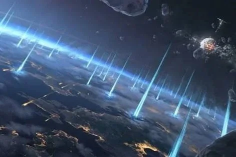 View of Earth from space with multiple vertical blue light beams pointing upward.