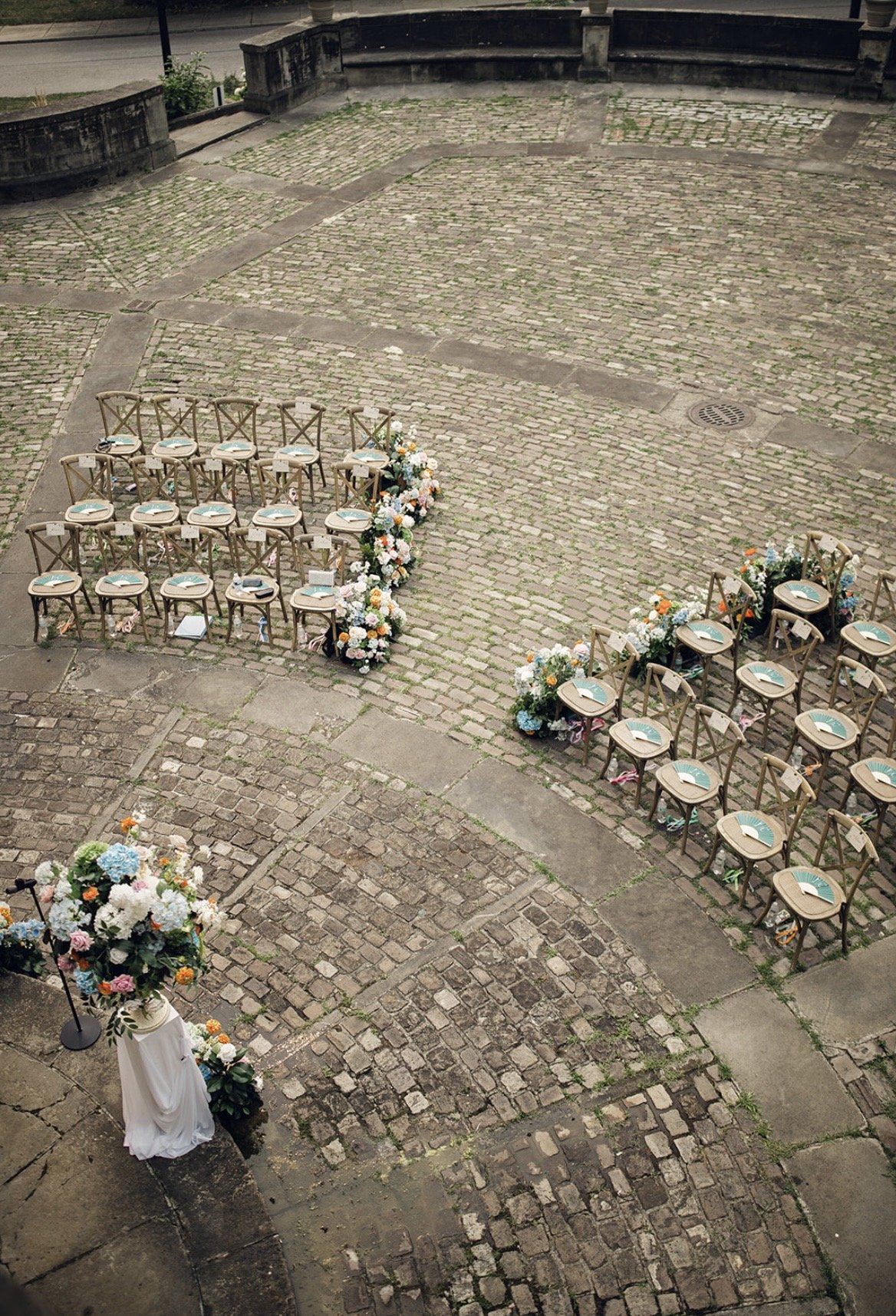 Statement silk wedding florals designed and installed by S.R. Event Design & Decor.