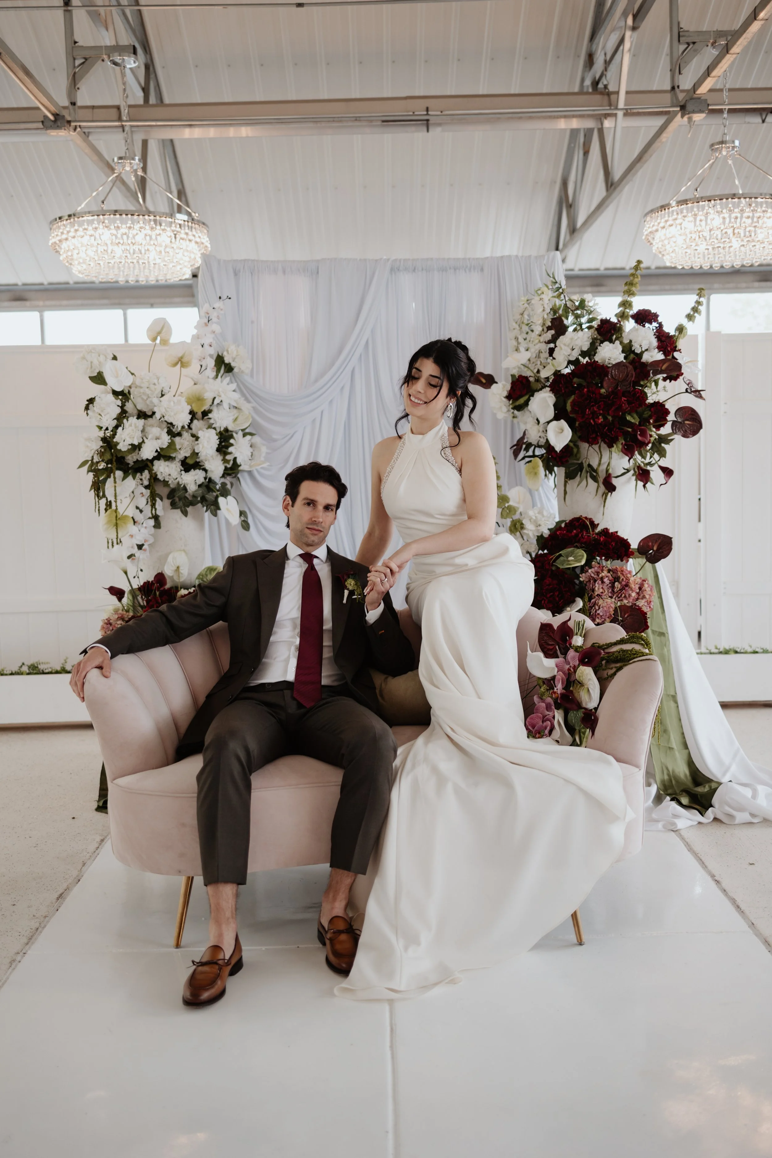 Ceremony Drapery & Burgundy Flowers Salin Simsek Photo .jpg