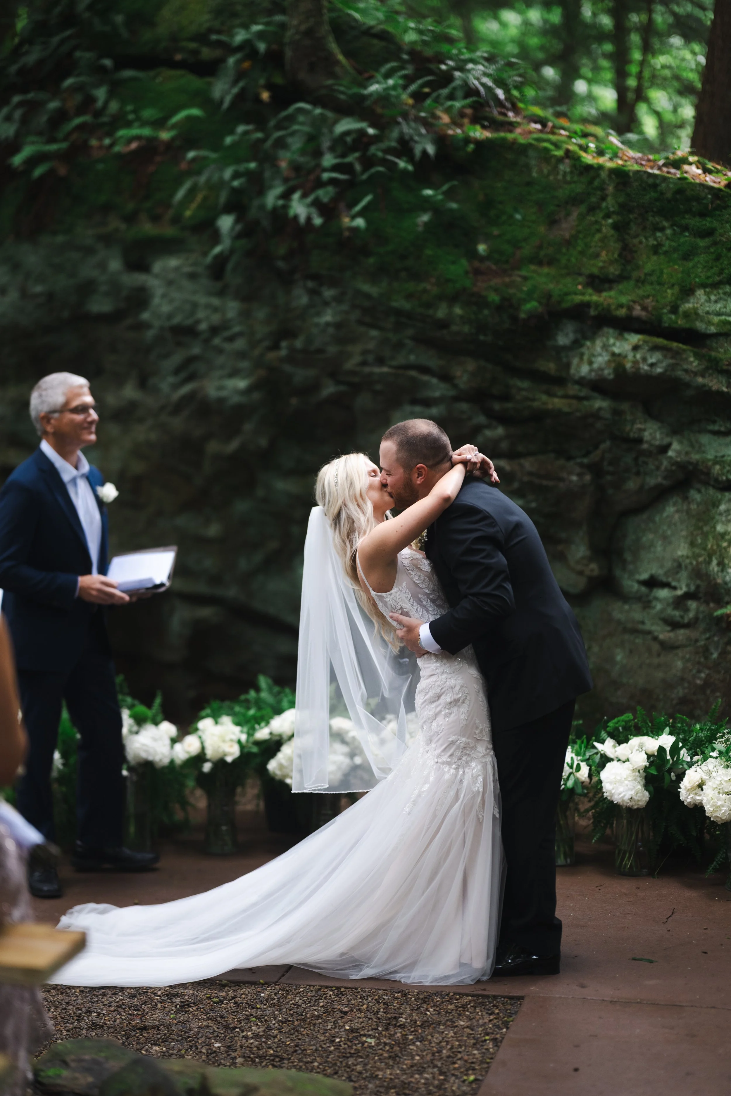 Trillium Woods Ceremony Kiss .jpg