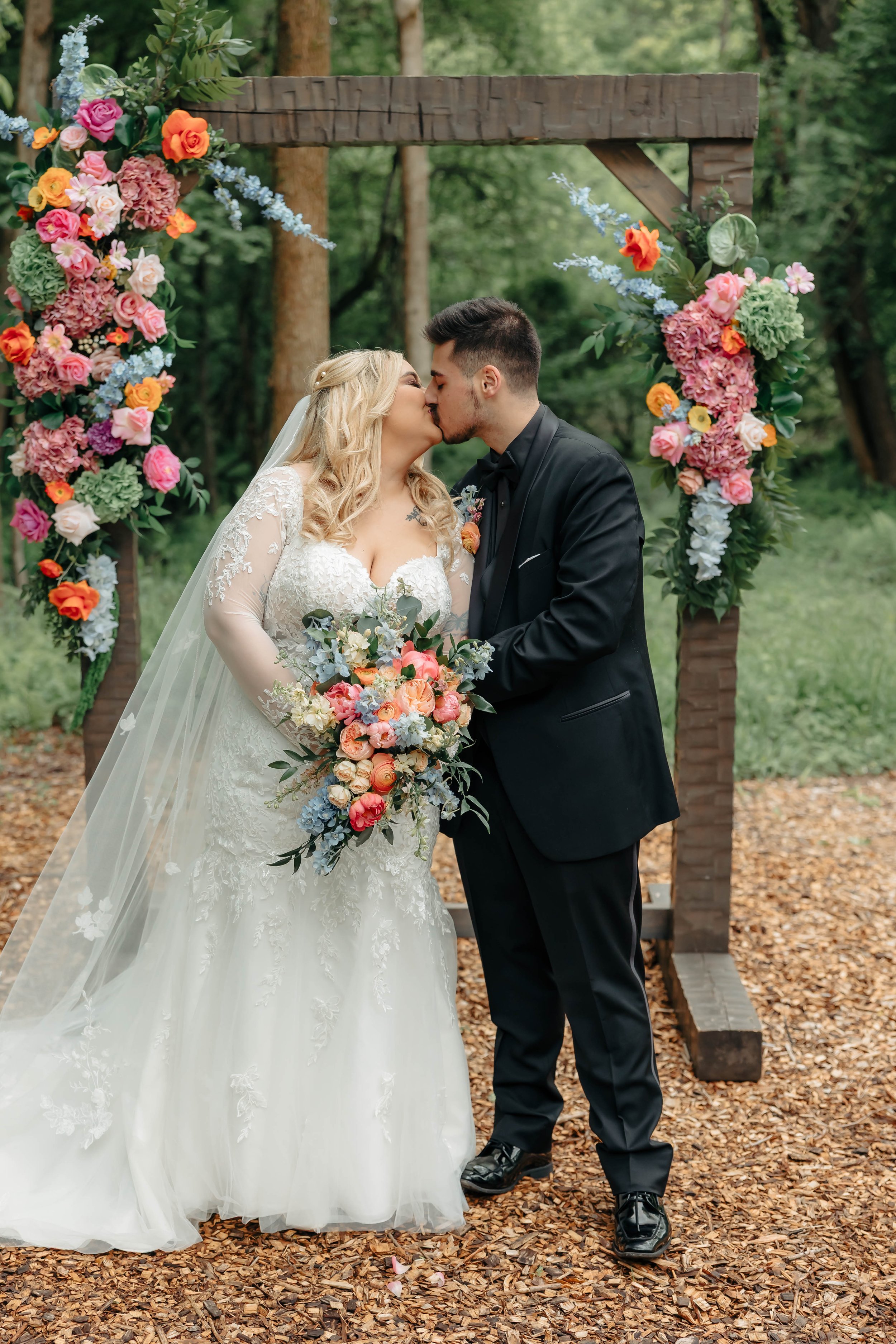 Altar Flowers Couple kiss shot 2 .jpg