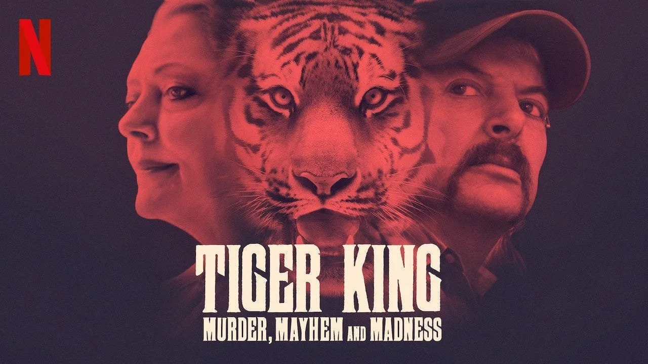 Cover art for the movie Tiger King with faces of two people and a tiger's face in the center, title text 'Tiger King: Murder, Mayhem and Madness', Netflix logo in the top left corner.