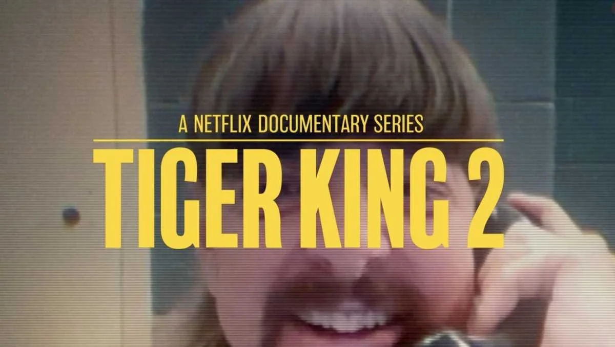 Title screen of a Netflix documentary series titled "Tiger King 2" with a smiling person's face in the background.