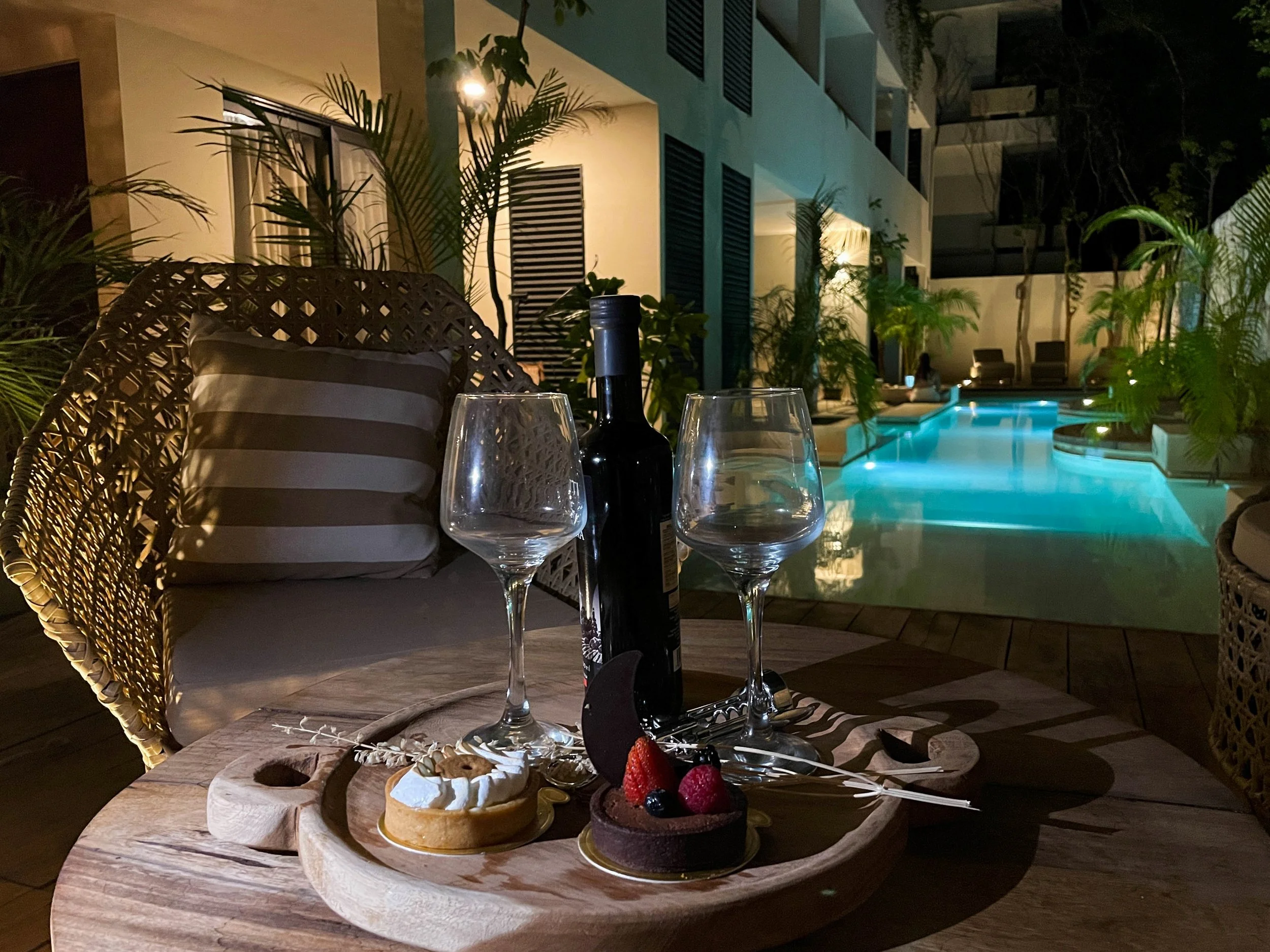 Wine glasses by pool