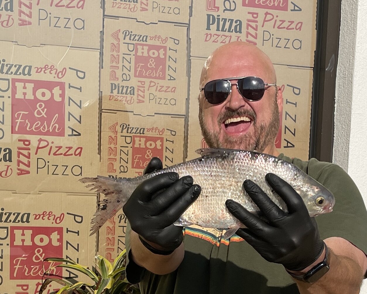 Just when you think life can't get any better, it starts raining fish... well A fish, Mr. Shad here fell right at my feet while I was tending to the plants in front of the shop. 

In honor of his life and the bird that didn't get it's meal, come in a